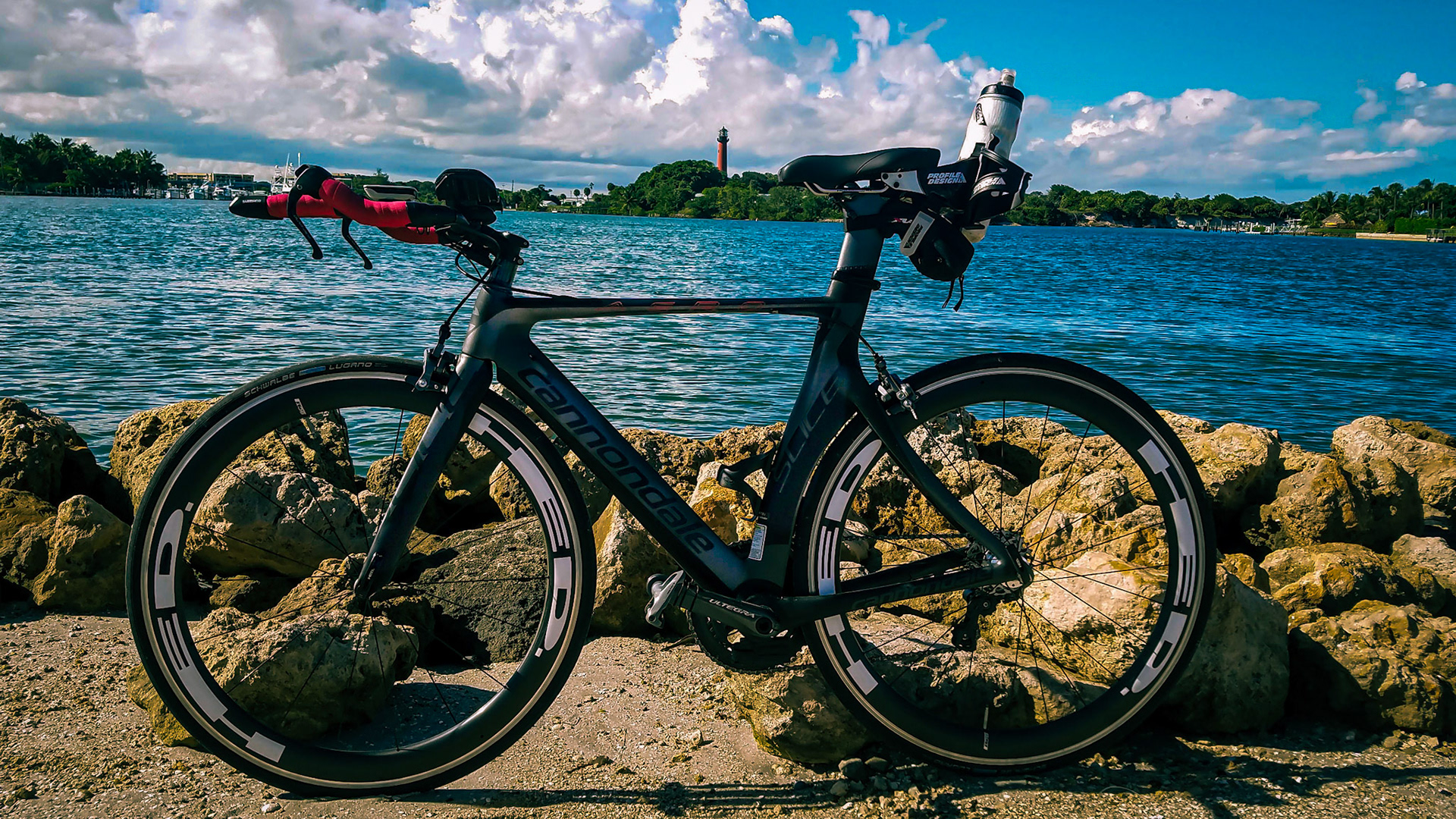 TT bike with Jupiter lighthouse background
