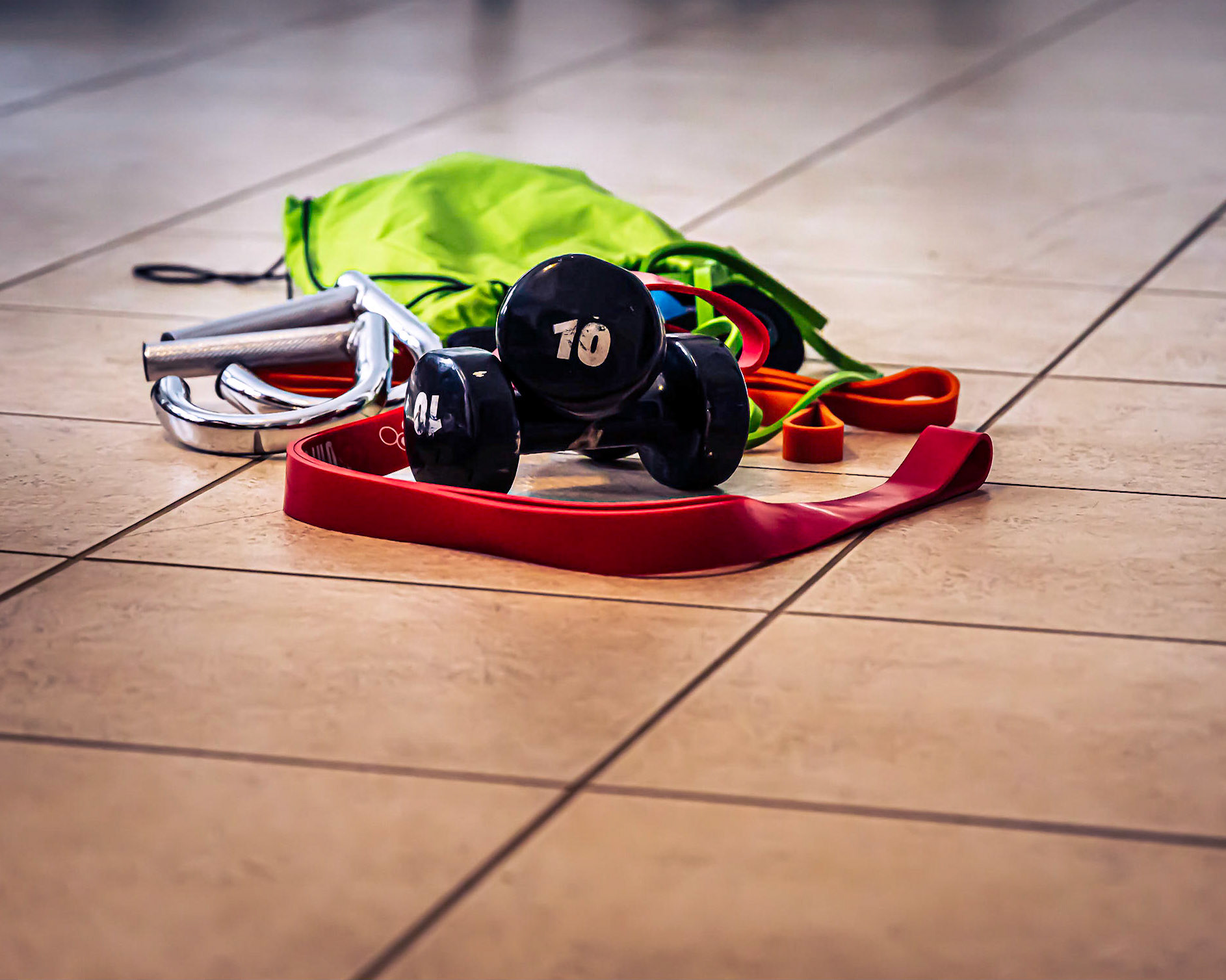 Working out at home with resistance bands and dumbells.