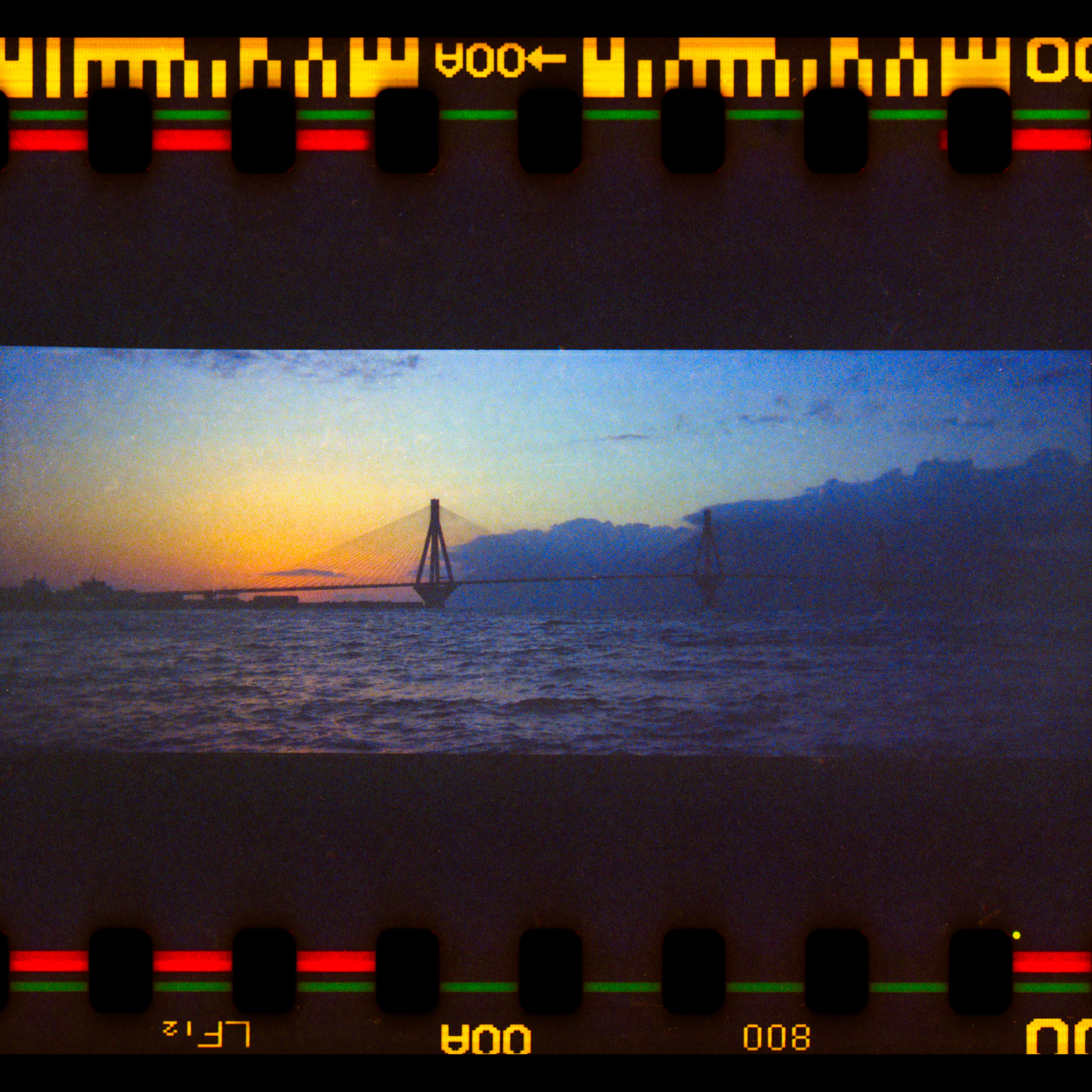 Seabreath.3 Seascapes,Greece,2022 With an old (20+ years)Fuji quicksnap panorama camera,shot at the sea & Rio-Antirio bridge