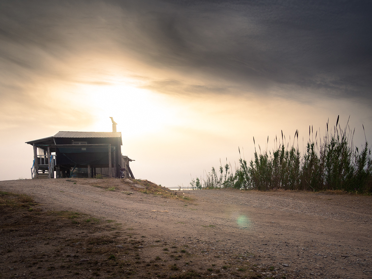 Dusk at the delta Where the river meets the Ionian sea & a sailor hut Western Peloponnese,Greece