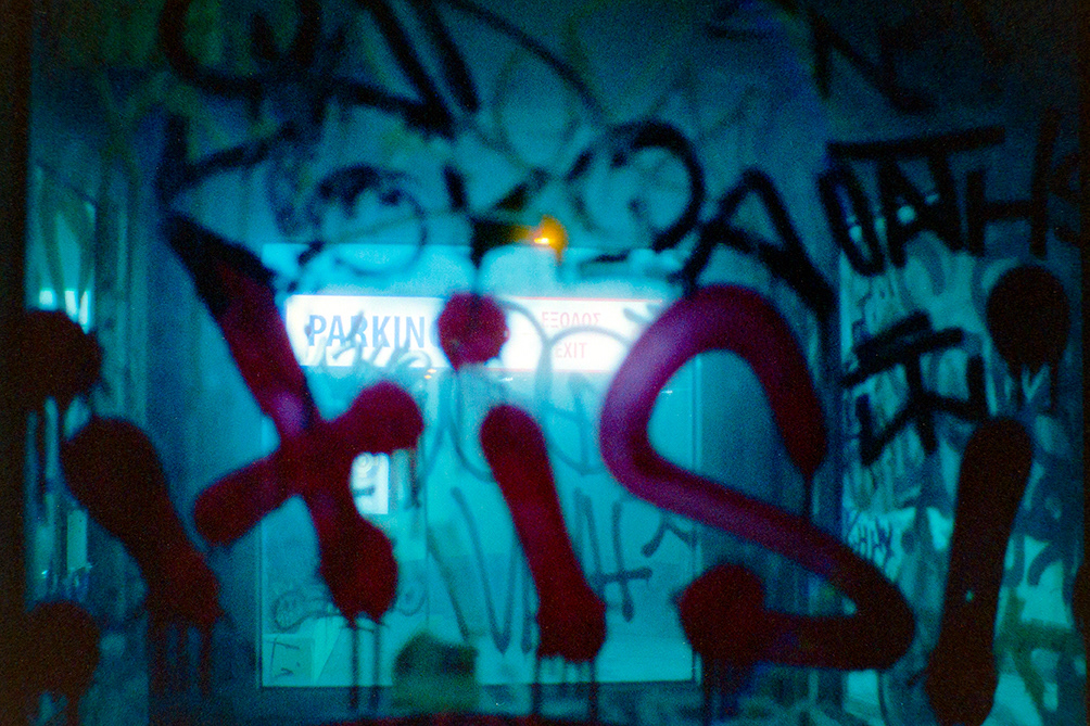 Night "chaos",through the glass Athens city at night,Dec.2022 Cinestill800t Nikonf301