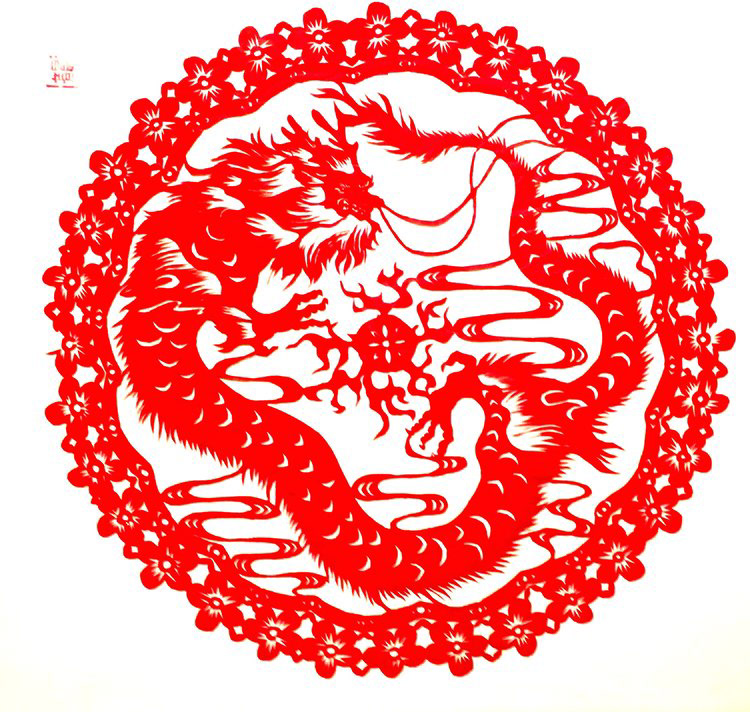 Paper Dragon Chen Shi ( CHINA) as an artist learnt as a little girl how to paper cut intricate designs.