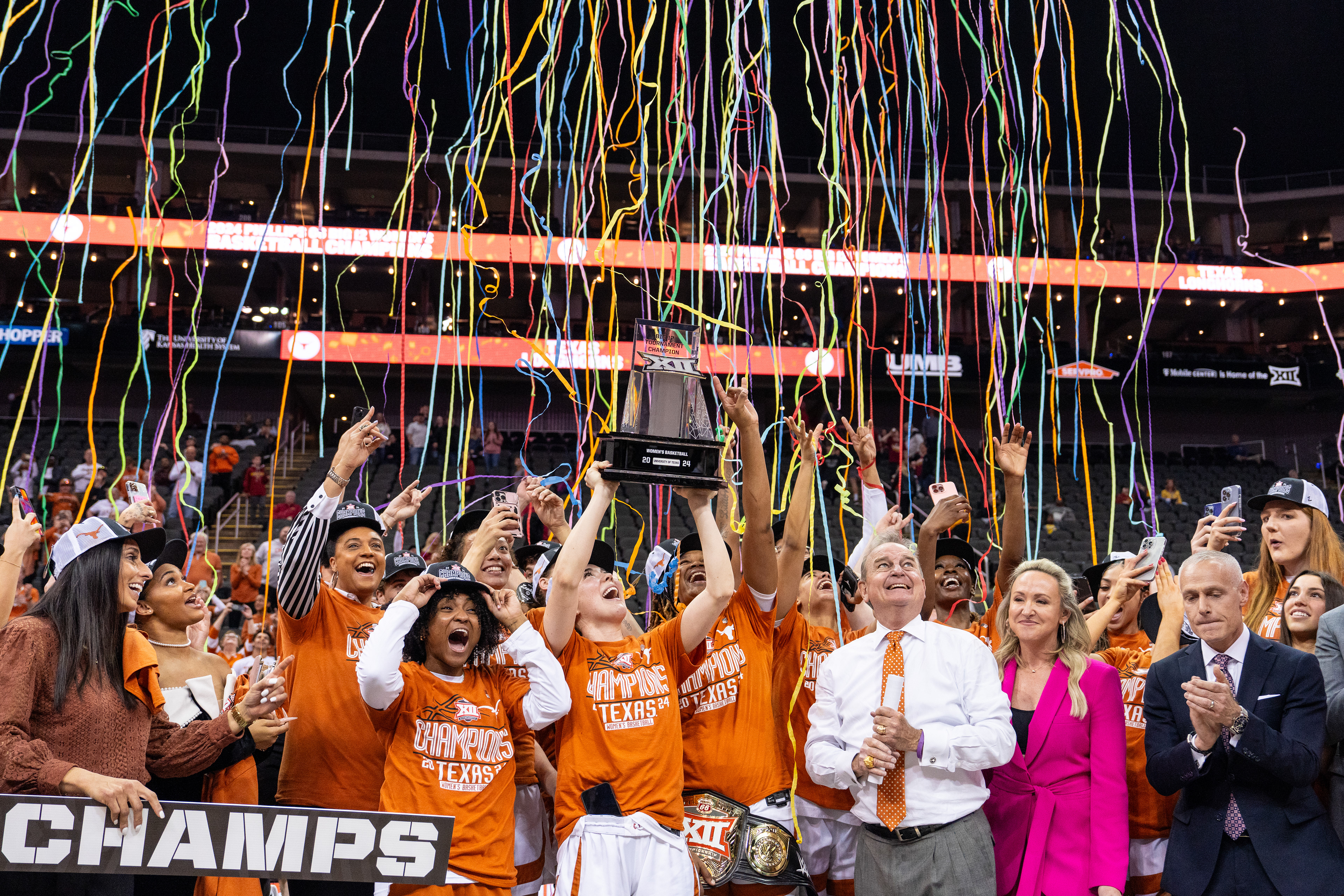 The Texas Longhorns celebrate after defeating the Iowa State Cyclones to win the championship game of the Big 12 Basketball Tournament at the T-Mobile Center in Kansas City, Missouri on Tuesday, Mar. 12, 2024.