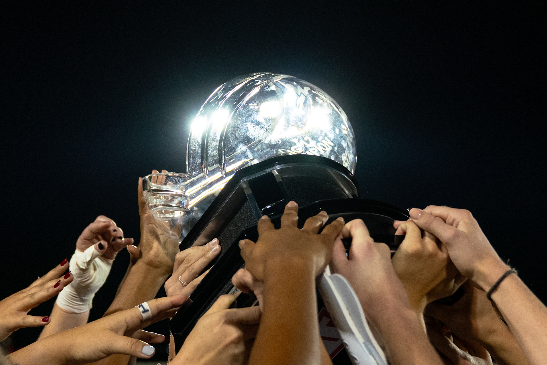 The Texas Longhorns soccer team hoists up the Big 12 trophy after defeating Oklahoma 3-1 and being named outright regular season conference champions at Mike A. Myers Stadium and Soccer Field in Austin, TX., Thursday, Oct. 27, 2022.