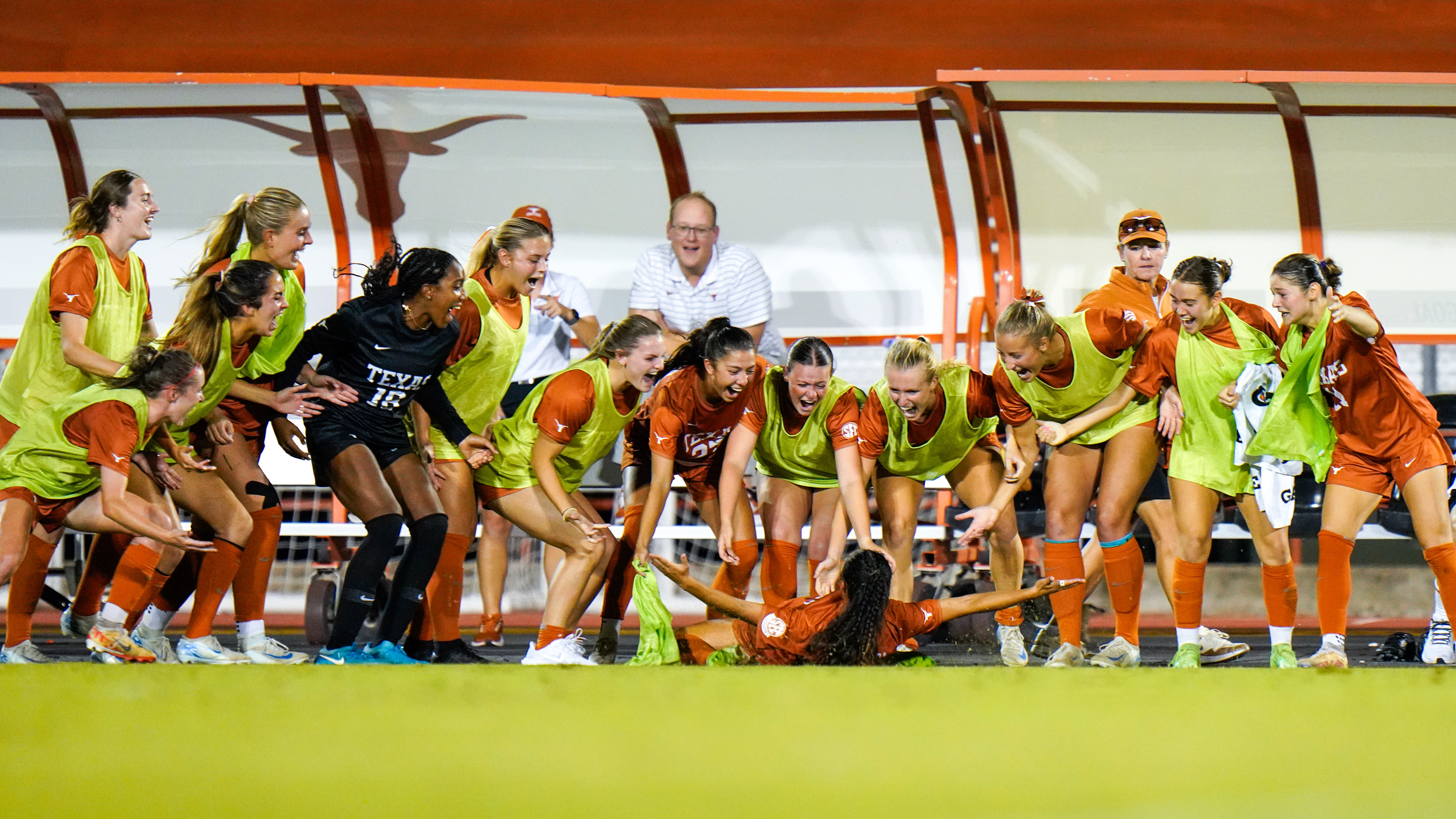 Texas defender Lauren Lapomarda slides  towards her cheering teammates after scoring a goal in the second half against Houston Christian at Mike A. Myers Stadium and Soccer Field in Austin, TX., Thursday, Sep. 12, 2024.