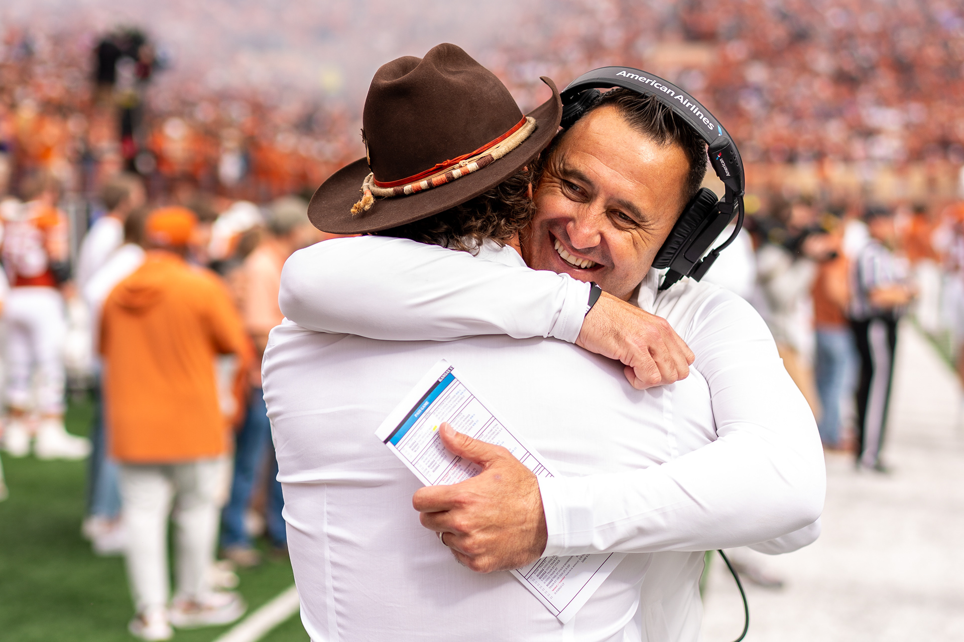 Head coach Steve Sarkisian of the Texas Longhorns hugs actor Matthew McConaughey prior to a game against the Kansas State Wildcats at Darrell K Royal-Texas Memorial Stadium in Austin, TX., Saturday, Nov. 4, 2023.