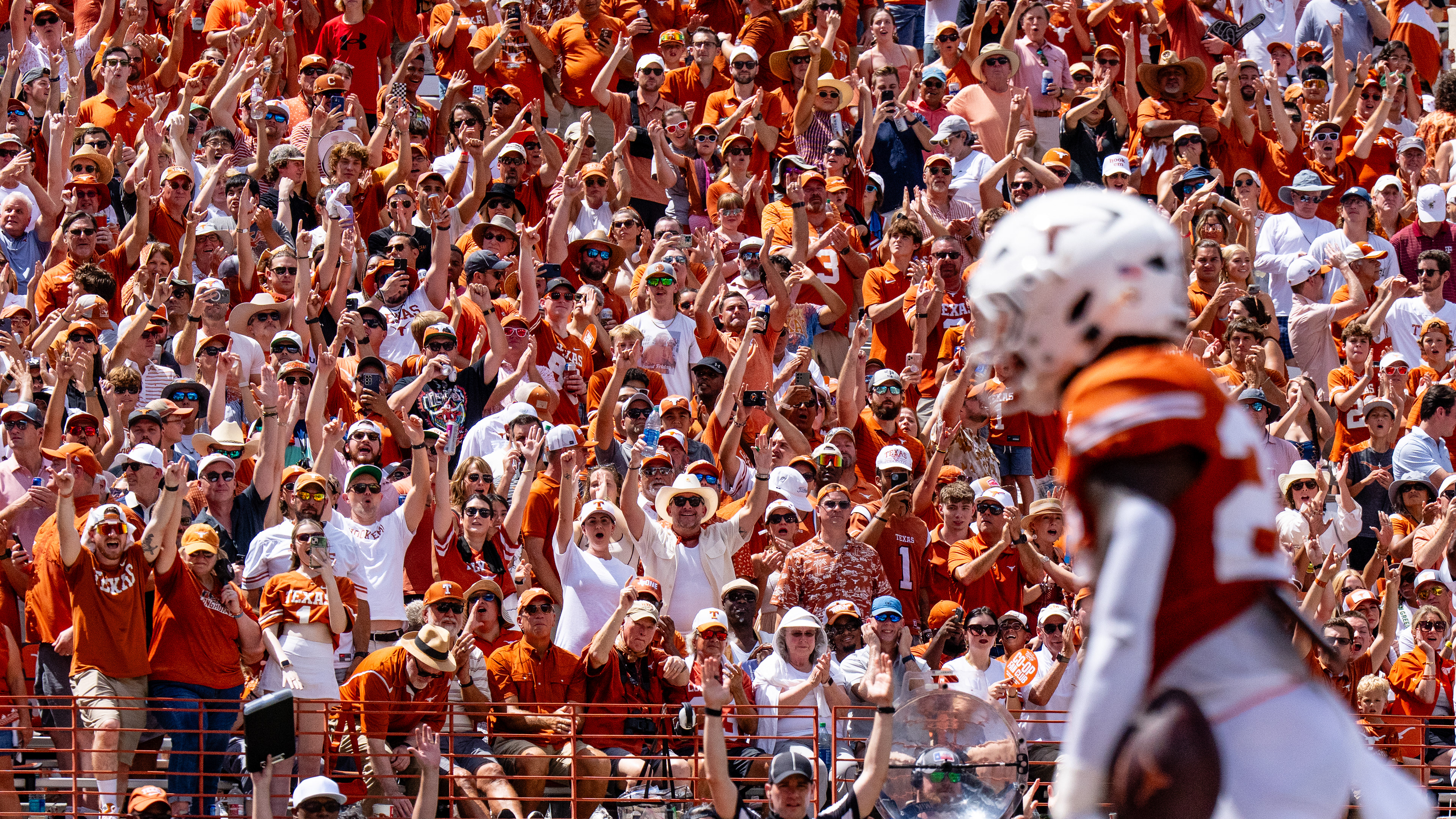 Fans cheer towards Texas Longhorns running back Quintrevion Wisner (26) following a rushing touchdown against the Colorado State Rams at Darrell K Royal-Texas Memorial Stadium in Austin, TX., Saturday, Aug. 31, 2024.