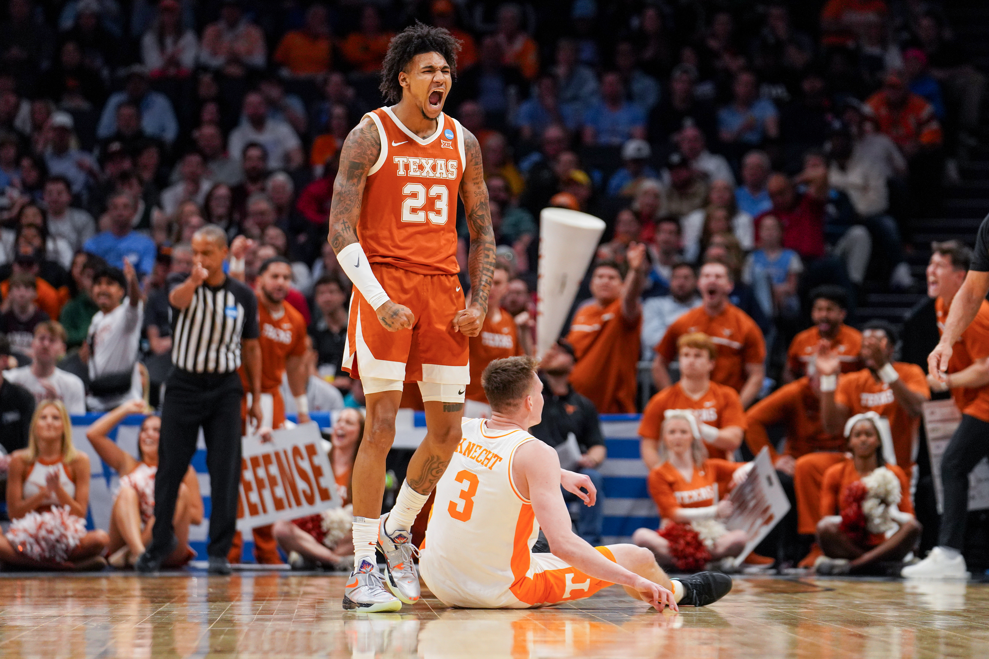 Texas forward Dillon Mitchell (23) reacts after a successful defensive play in the second round of the 2024 NCAA Tournament against Tennessee at Spectrum Center in Charlotte, N.C., Saturday, Mar. 23, 2023.