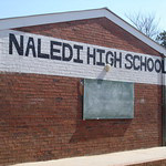 Figure 1: The bare, brick facade of Nadeli High School (Ismail Farouk via Flickr)