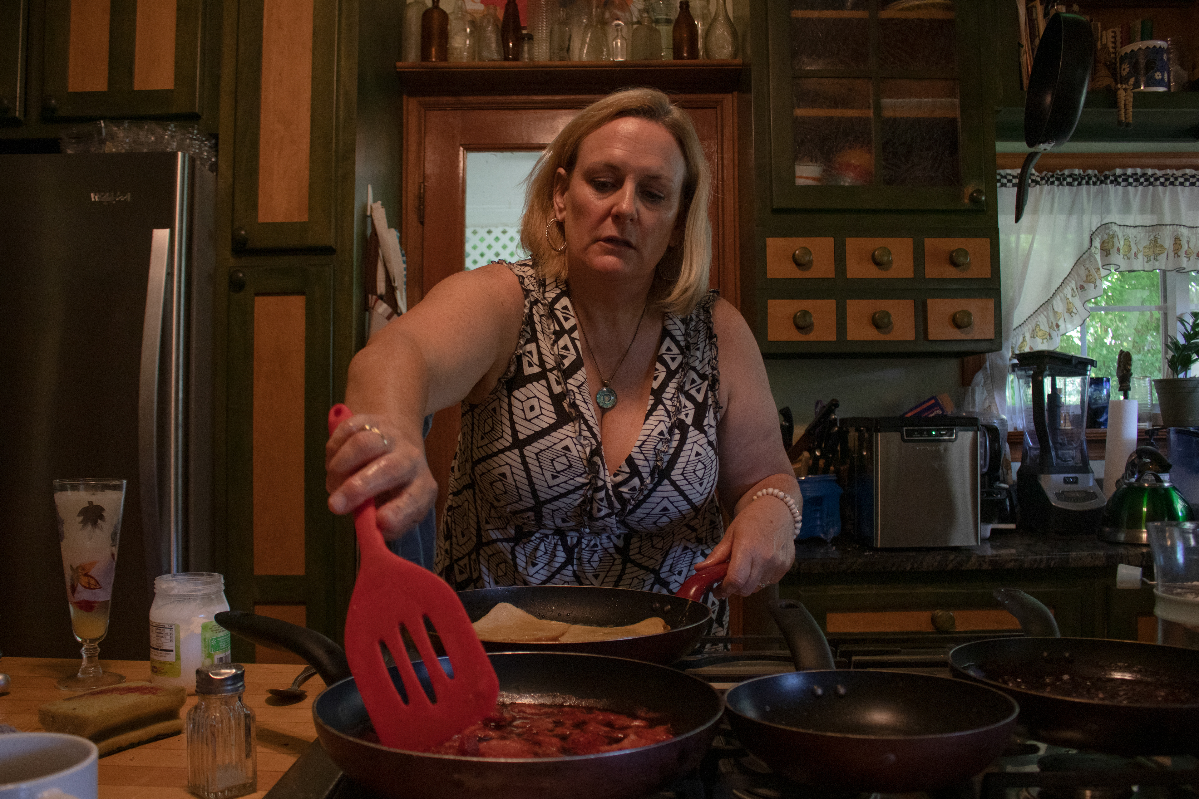 Mom cooking stuffed french toast (Dad's favorite) for Fathers' Day. 