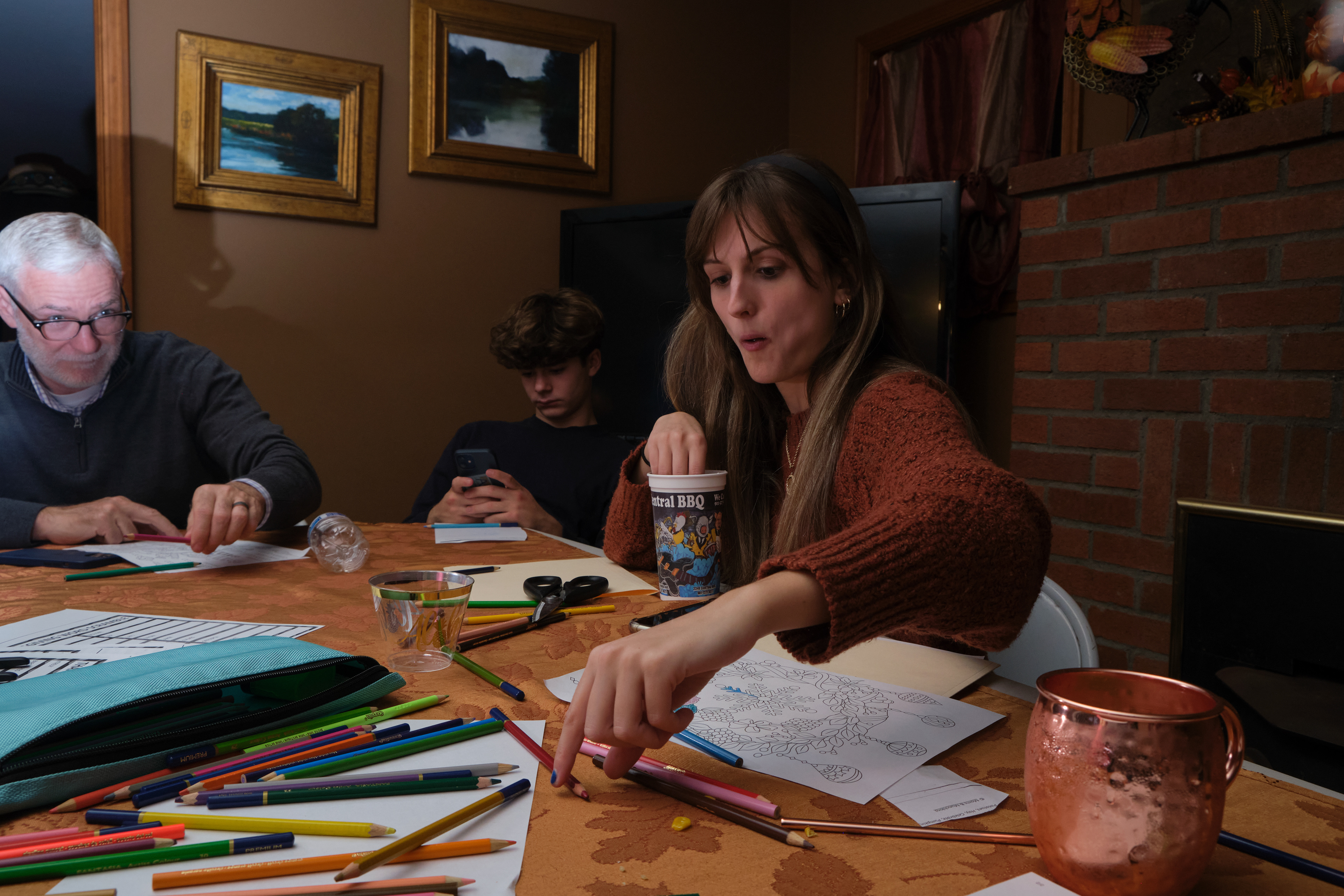 Katie always finds her way back to the kids' table. 