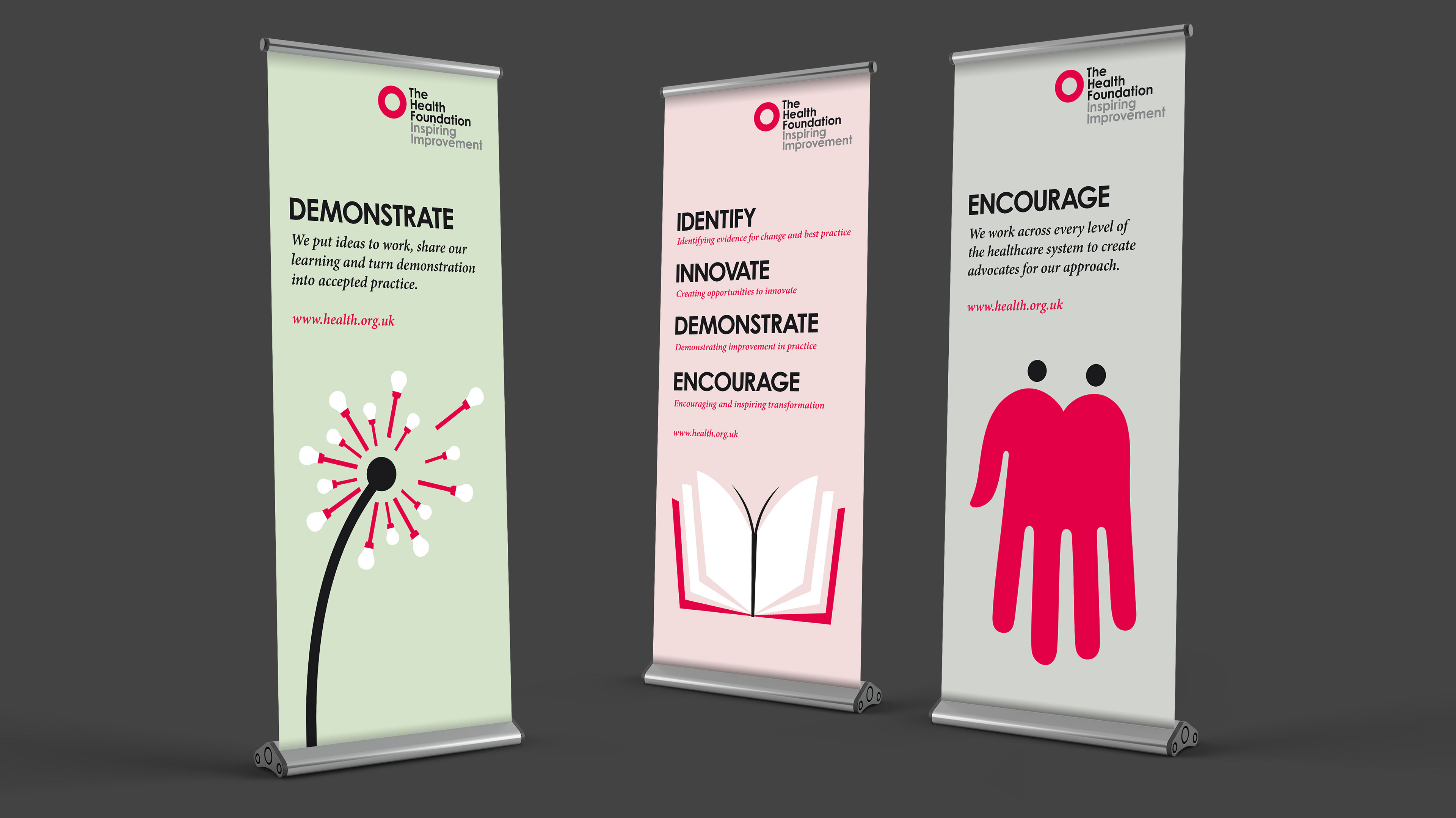 Three pull-up banners featuring The Health Foundation's pillars - Identify, Innovate, Demonstrate