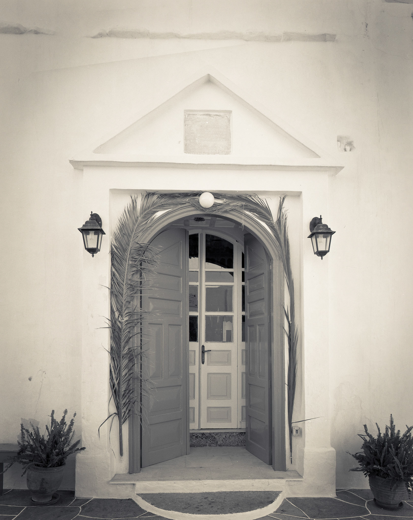 Palm Branches on Church Door. Panagia Koghi Church in Artemonas