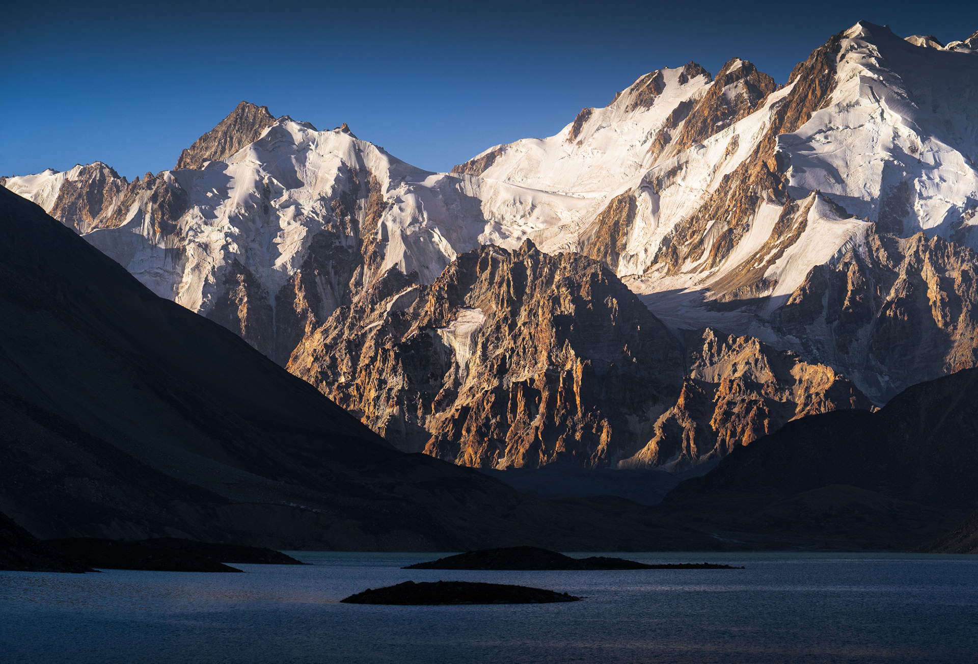 Sunrise on the jagged peaks of the Shakhdara Mountains, Tajik National Park, Pamir, Tajikistan