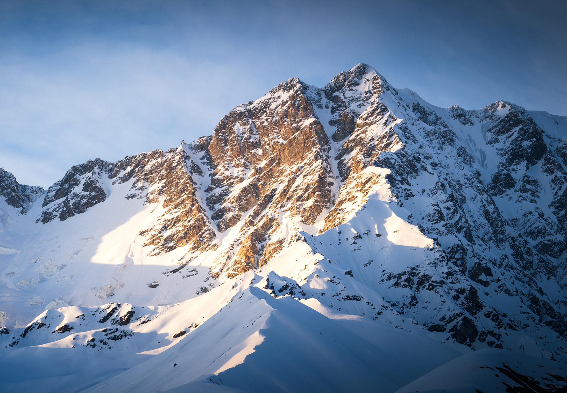 Sunset over a snow mountain in Ushguli, Svaneti.