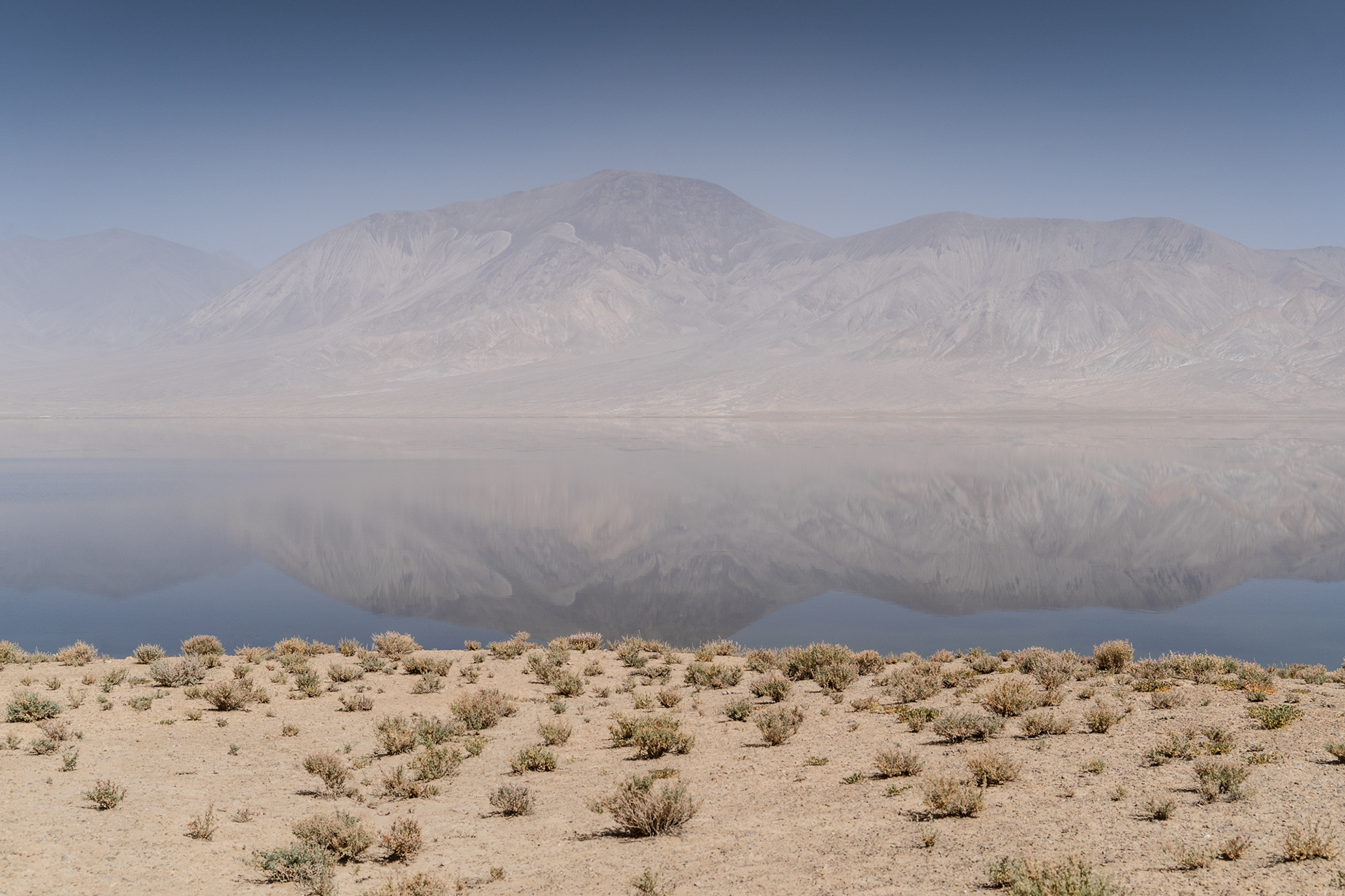 Rangkul Lake and hazy mountains of China in the distance, Rangkul, Pamir, Tajikistan