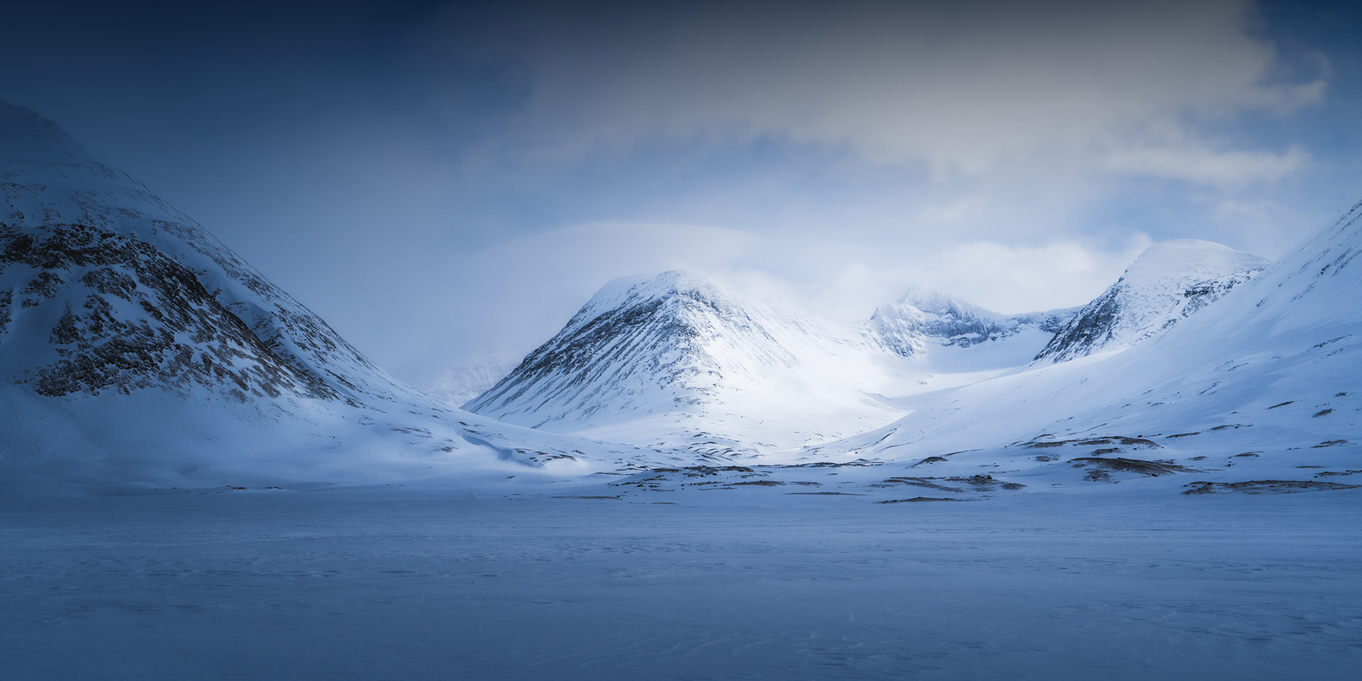 Winter Arctic Landscapes of the snowy glaciated mountains of Sarek National Park, Swedish Arctic
