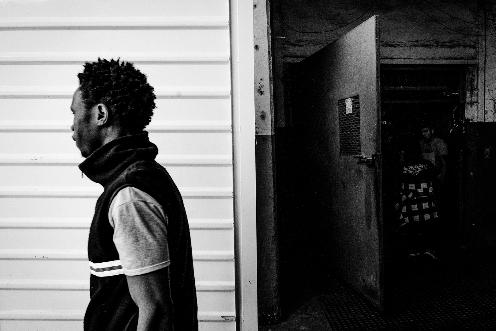 At the intersection of "Nueva York" and "Marsella" streets in the town of Berisso there is a sign that says that this corner is "kilometer 0" of Peronism. From there, where the Swift meat packing plant operated decades ago, the columns of October 17, 1945, marched to Plaza de Mayo to demand Perón's release. Today, this industrial area next to the port, abandoned for years, is once again being recovered by the workers' movement, now in the form of its new emergent, the "popular economy". The textile cooperatives of seamstresses and seamstresses of Argüello and Unión move their textile poles to the fourth floor of that old and worn-out building that saw the birth of Peronism as a movement and is reborn as a productive space, with the workers on the margins, informal, fighting for the most basic rights, escaping from clandestinity. In Buenos Aires, Argentina, on June 2, 2023. PHOTO/Santi Oroz.