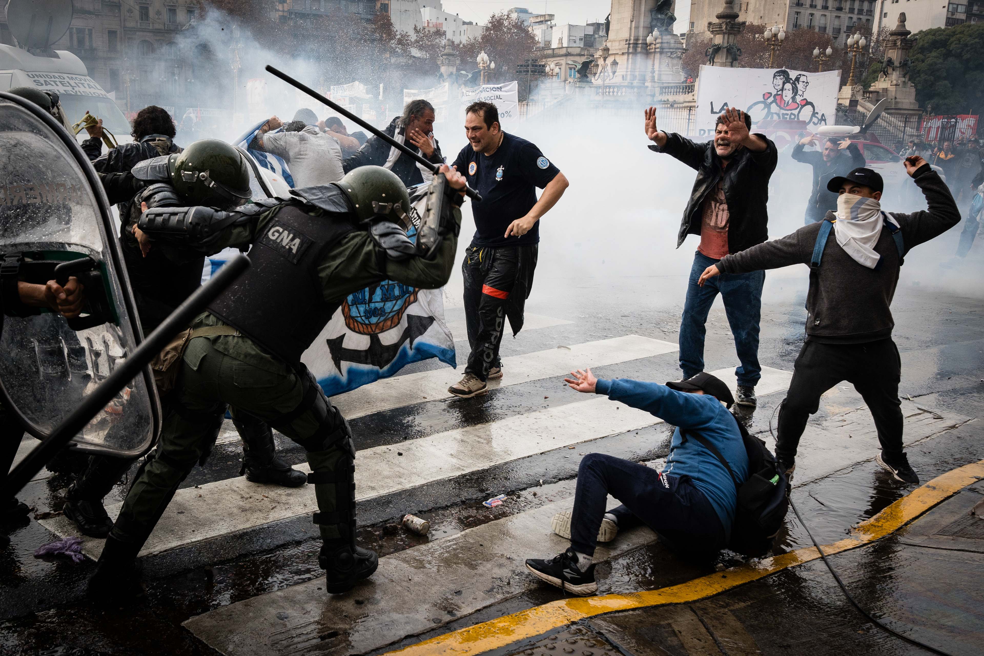 National Gendarmerie forces confront the protesters as they protest outside while the Senate debates Javier Milei's Ley Bases. The Senate Chamber of the Argentine Congress is debating Javier Milei's Ley Bases, which has already passed the Chamber of Deputies. Meanwhile, hundreds of thousands of demonstrators are protesting in the streets, leading to confrontations and repressive actions by security forces, in Buenos Aires, Argentina, on June 12, 2024. PHOTO: Santiago Oroz