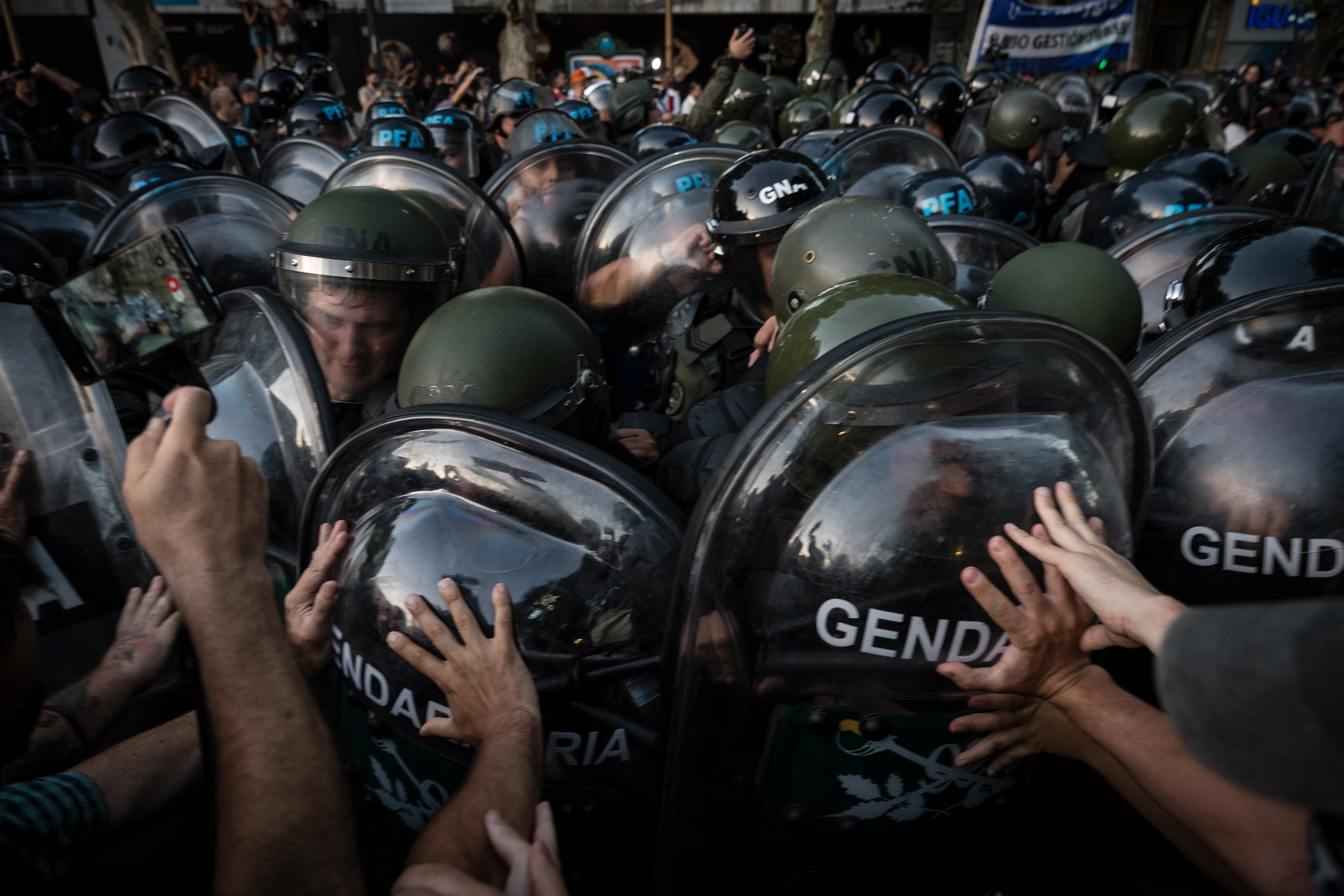 Protest and repression outside the National Congress while Javier Milei's Omnibus Law is being debated in Congress, in Buenos Aires, Argentina, January 31, 2024. PHOTO/Santi Oroz.