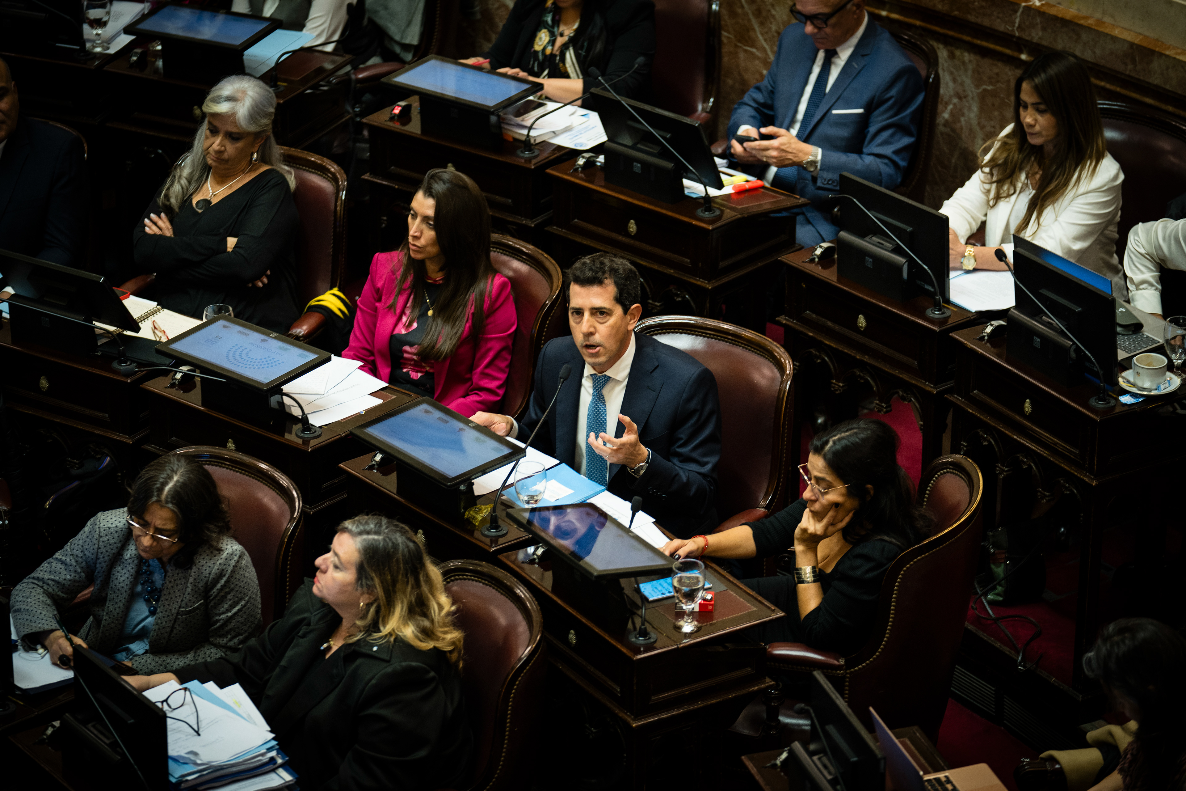 Senator Eduardo "Wado" de Pedro speaks at the session. The Senate Chamber of the Argentine Congress is debating Javier Milei's Ley Bases, which has already passed the Chamber of Deputies. Meanwhile, hundreds of thousands of demonstrators are protesting in the streets, leading to confrontations and repressive actions by security forces, in Buenos Aires, Argentina, on June 12, 2024. PHOTO: Santiago Oroz