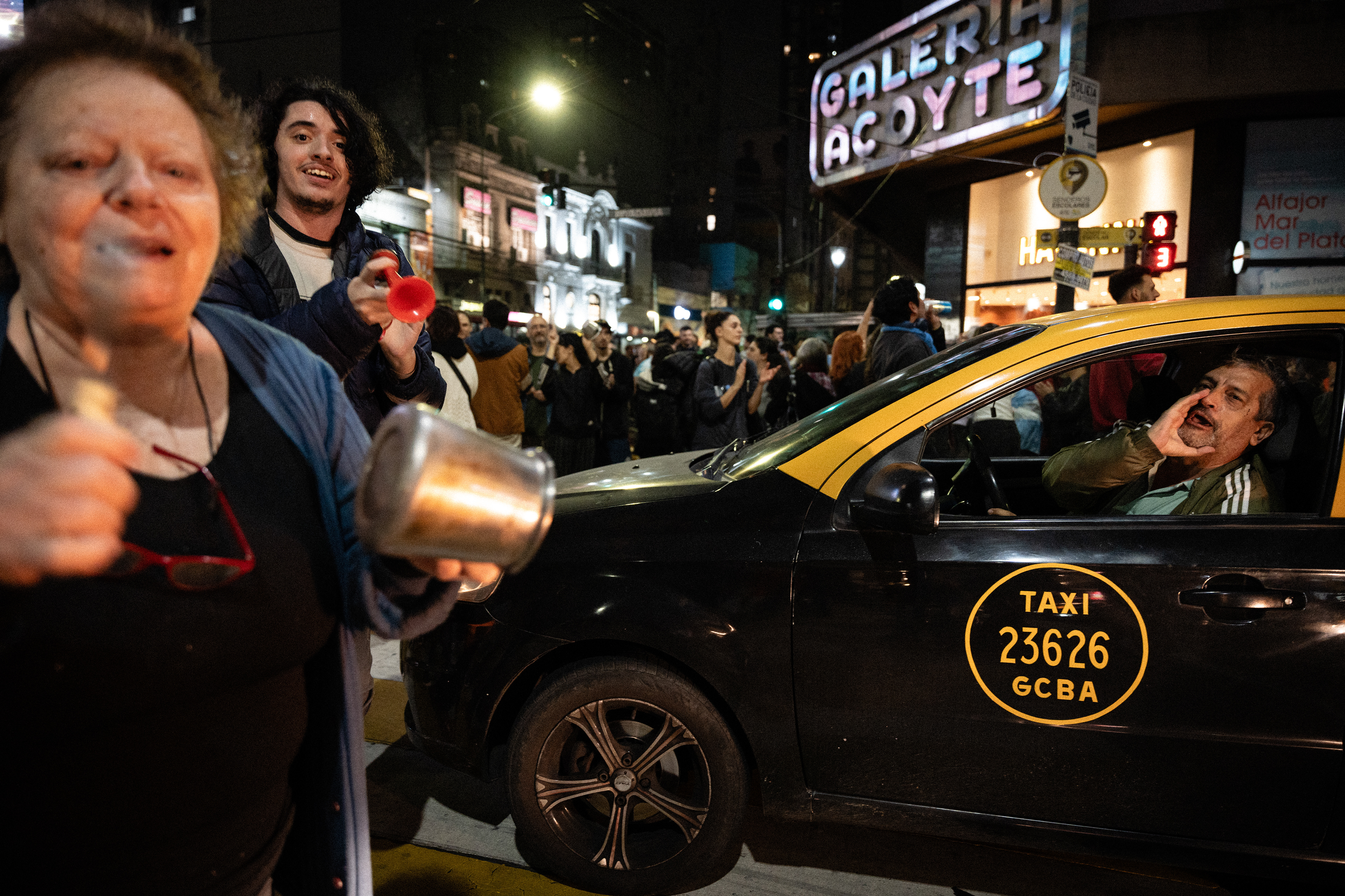 Neighbors gather at the corner of Acoyte and Rivadavia to protest against the Bases Law promoted by Javier Milei, in Buenos Aires, Argentina, on June 12, 2024. PHOTO/Santiago Oroz.