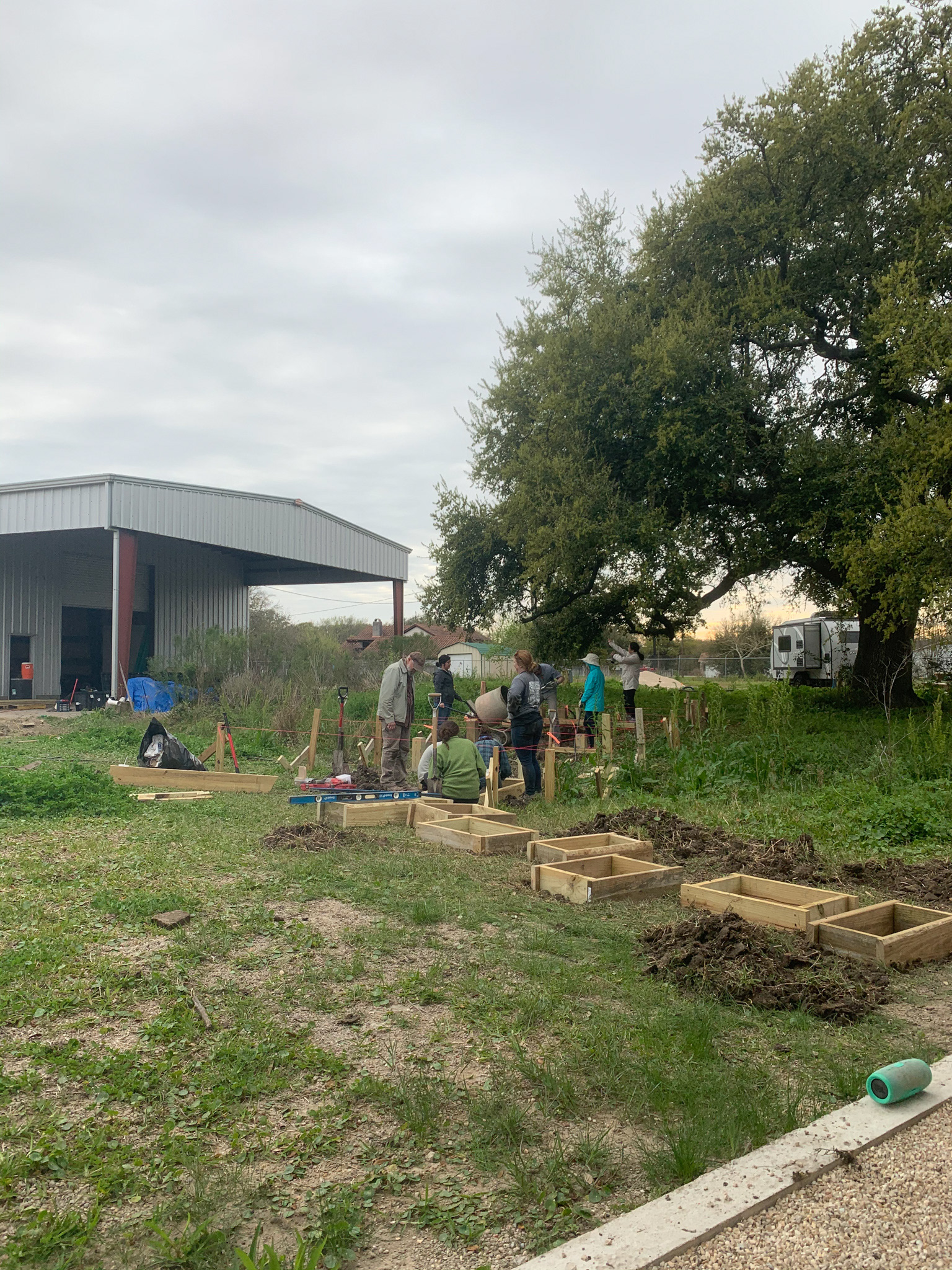 Overall progress during build as concrete is poured for column footings.