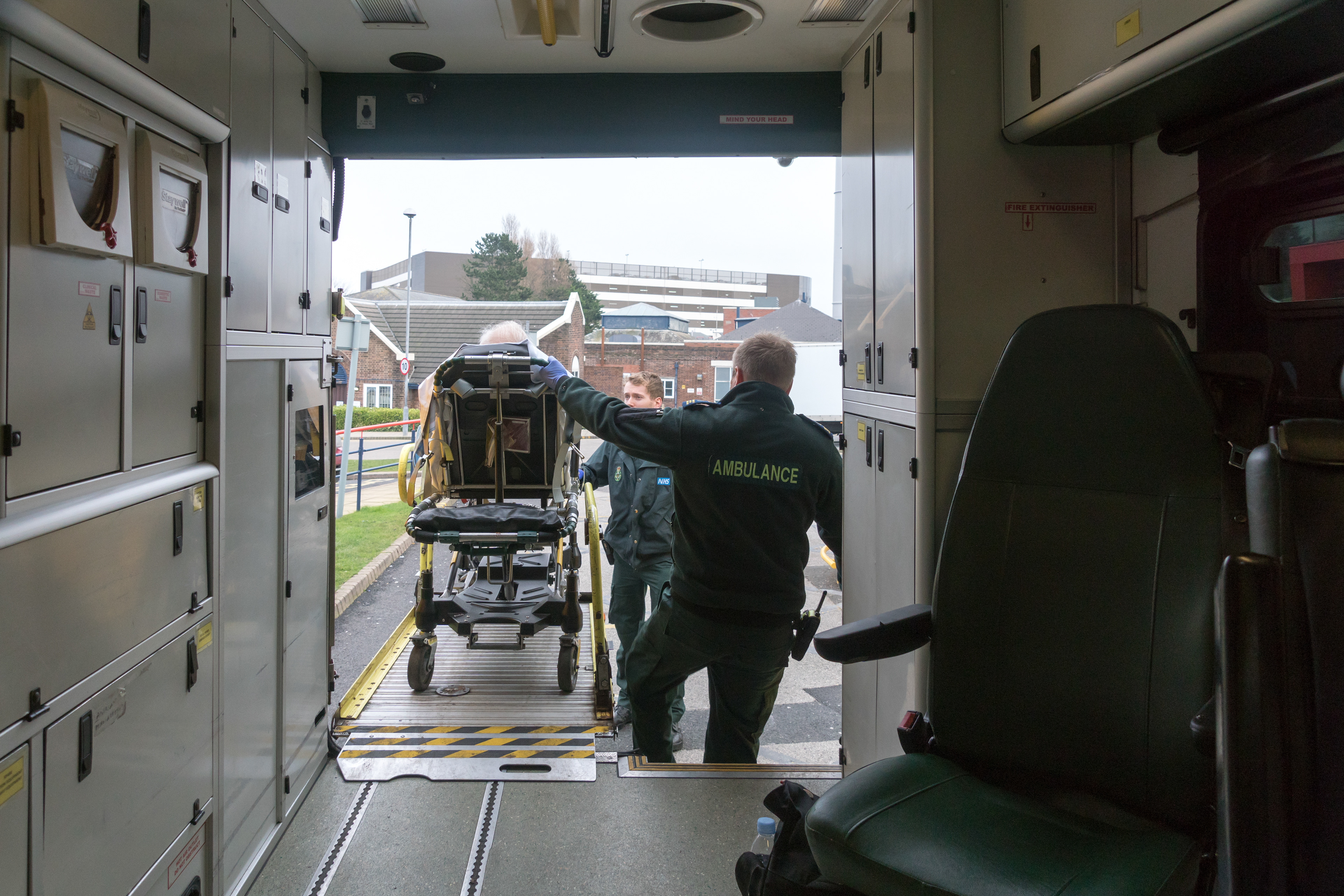 Paramedics wheel an elderly patient into A&E at Blackpool Victoria Hospital during a media ridealong