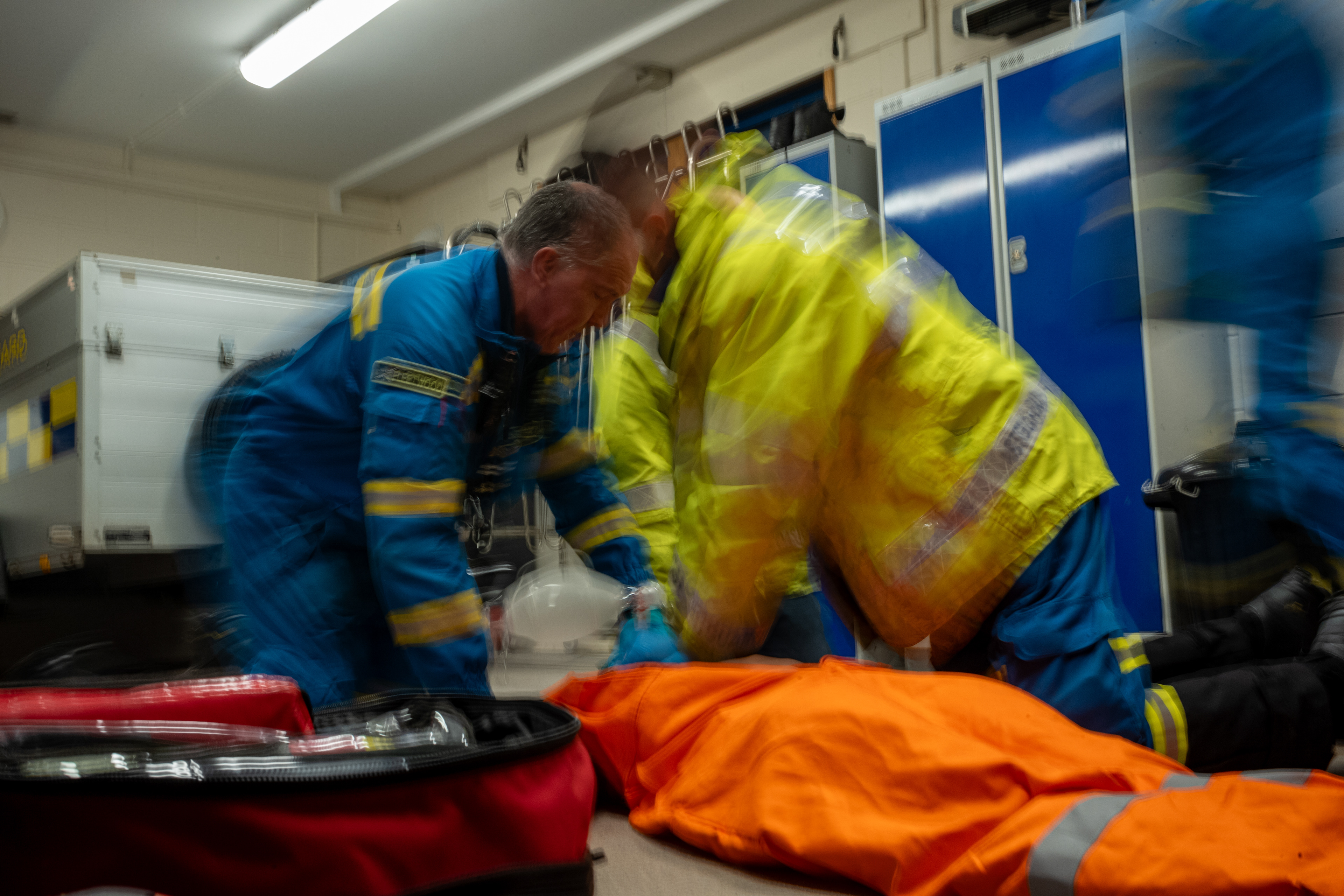 Coastguard volunteers practice their CPR skills during first aid training in 2025