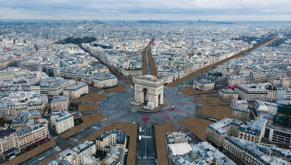 Asphalt is broken-up and lets the earth re-emerge in Paris (place Charles de Gaulle).