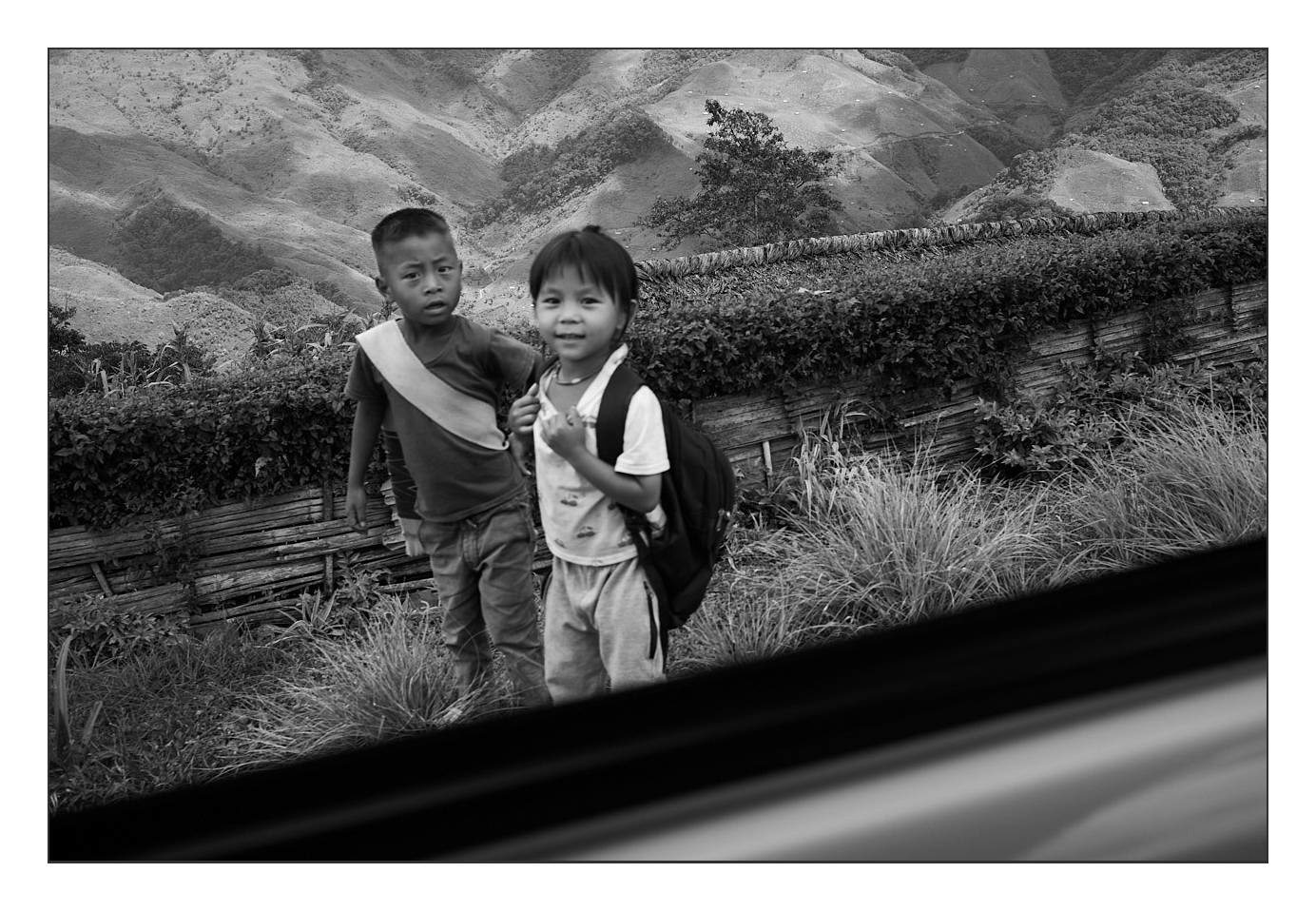 Kids playing by the roadside
