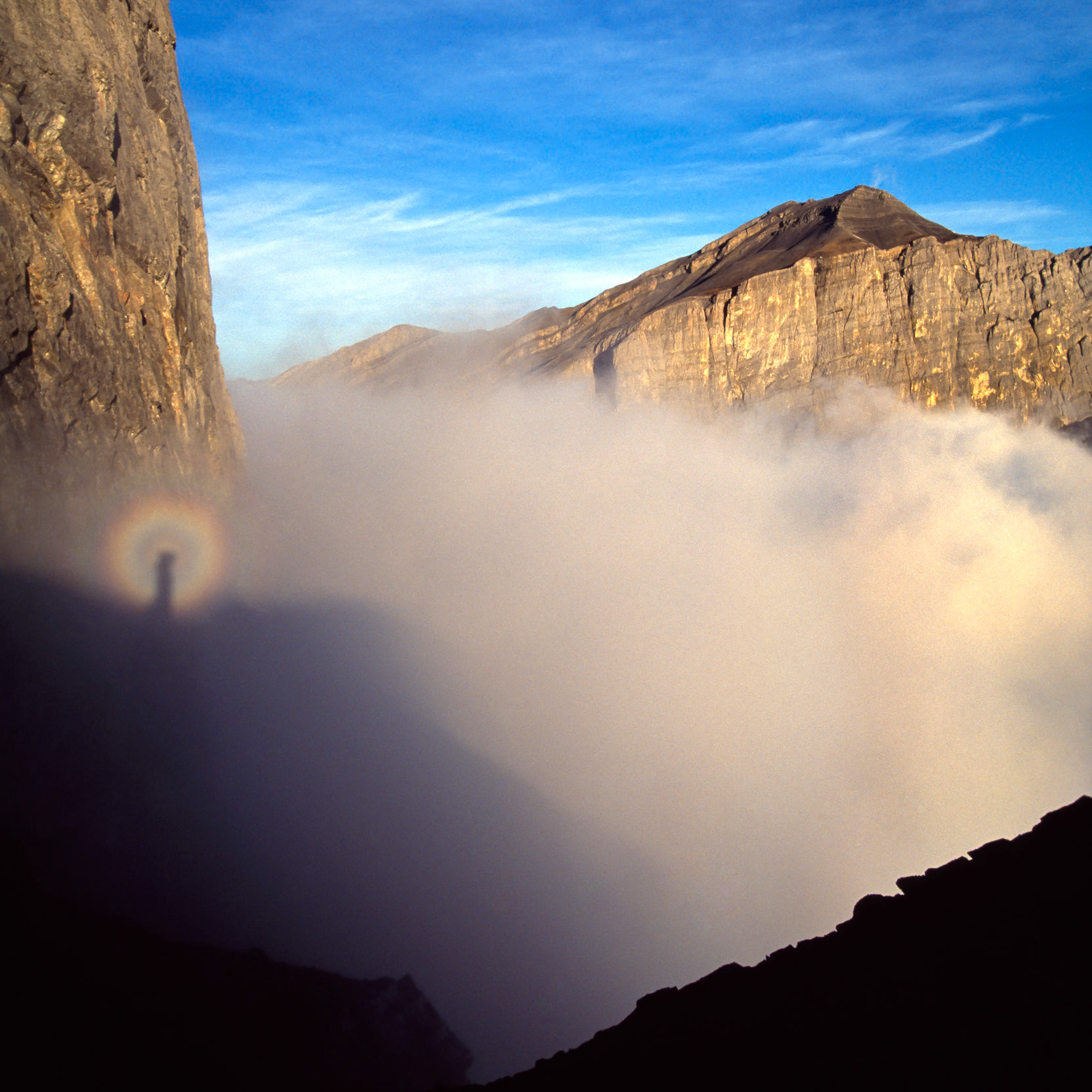 Spectre of the Brocken glory beneath Ha-Ling peak in Canmore.