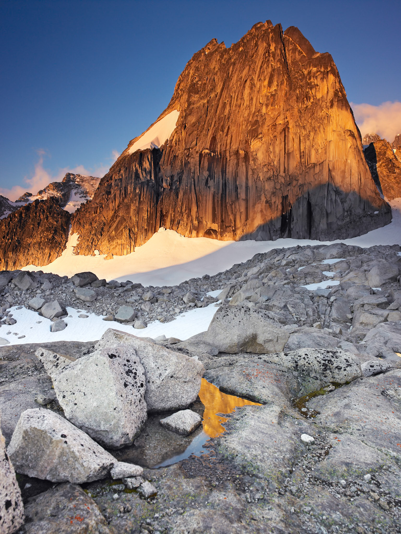 Snowpatch spire in Bugaboo National Park dominates the skyline in the Kain Basin.