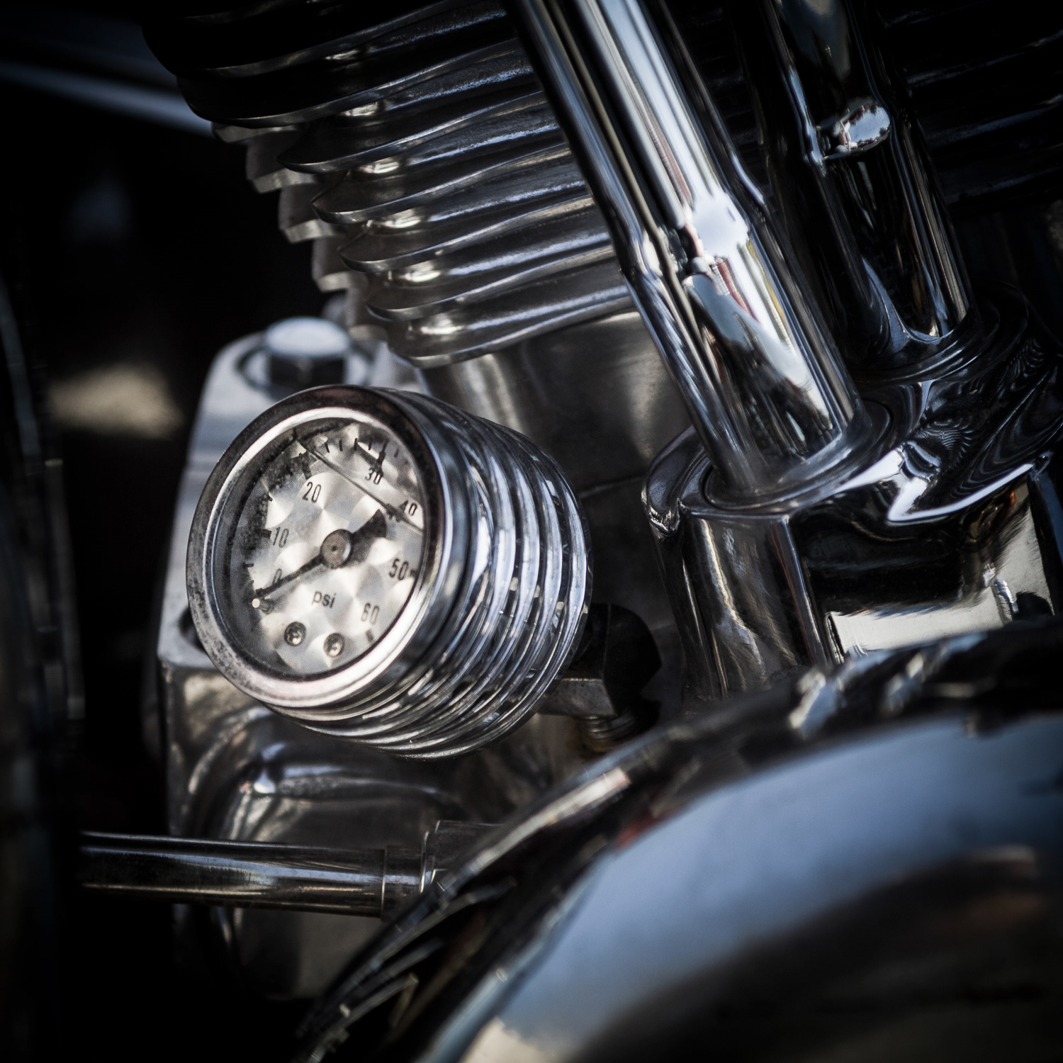 under pressure..Guage on a Harley Motorcycle cracked under pressure...60th Anniversary Hollister Harley Rally, CA