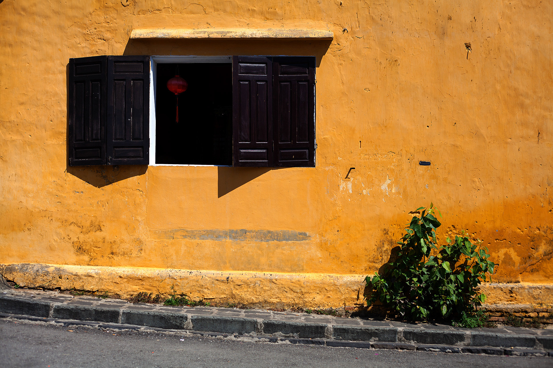 Hoi An lantern in a window