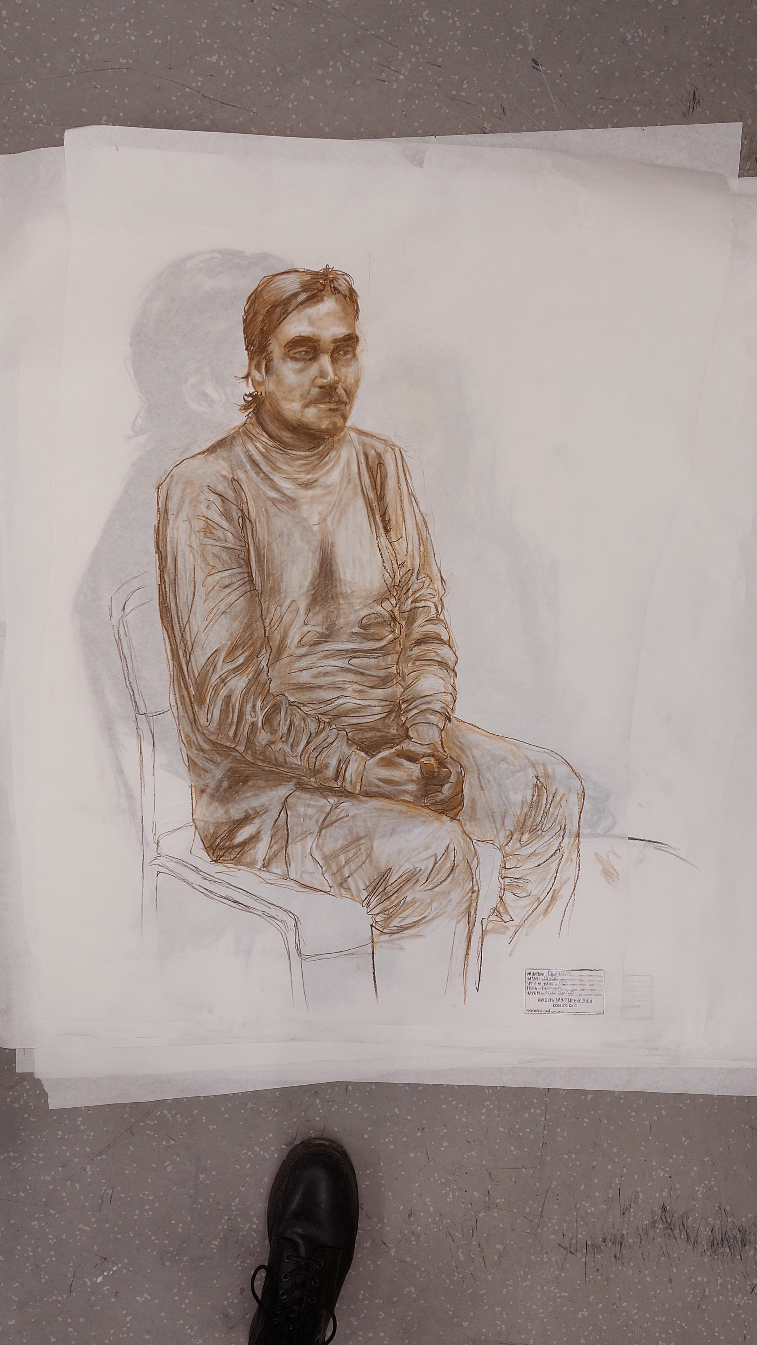 The Sitting guy