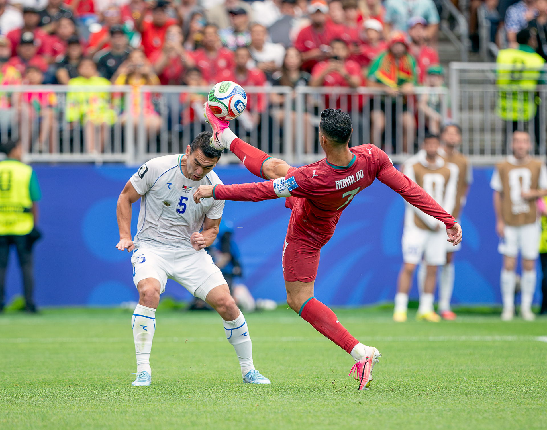 Still my favorite photo I took at any of the FIFA World Cup games is this one. Ronaldo steals the ball from Uzbekistan defender Rustam Ashurmatov