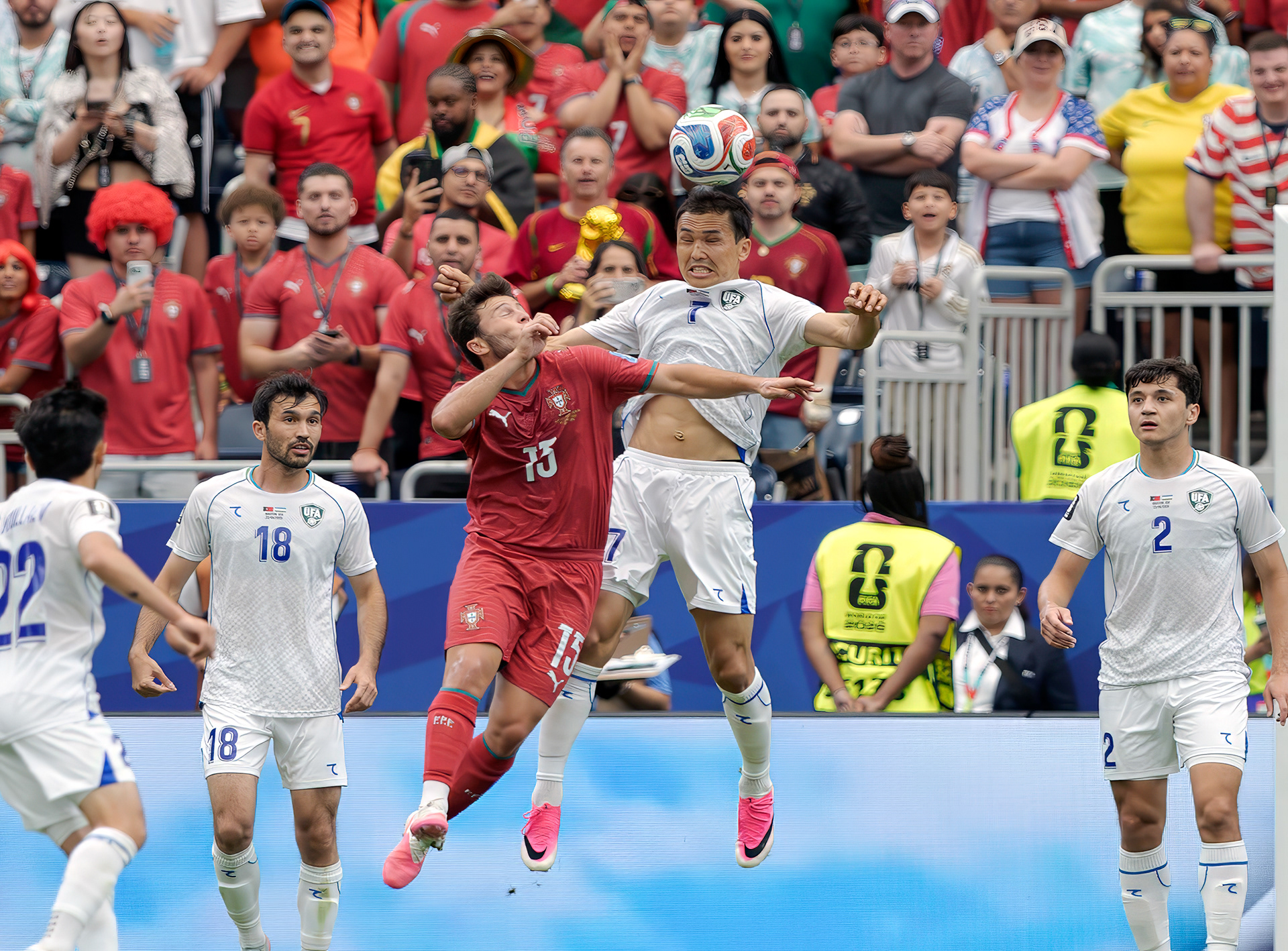 Uzbekistan midfielder Otabek Shukurov gives maximum effort with this header 