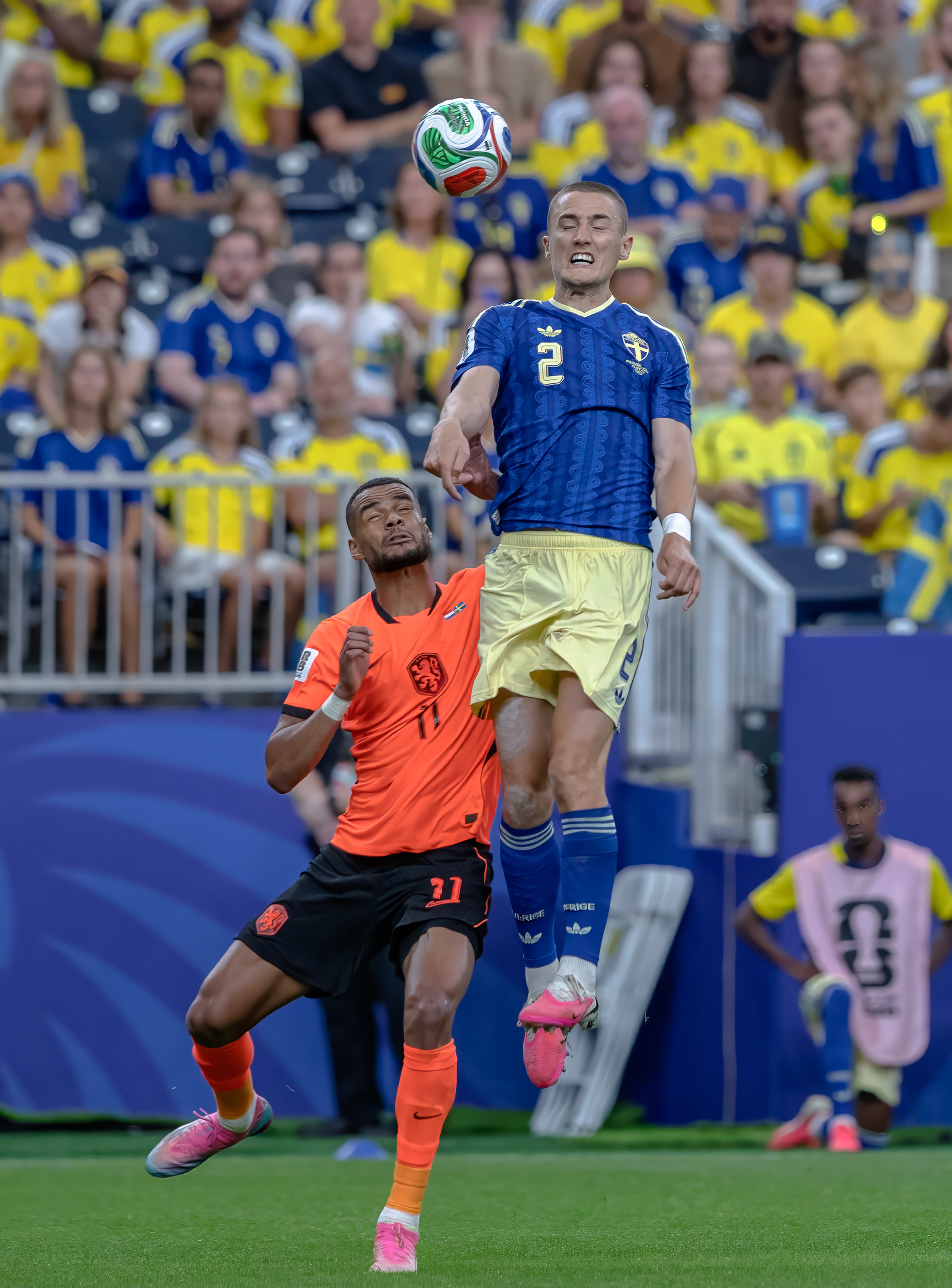 Sweden's Gustaf Lagerbielke gets a huge header in a match against Netherland