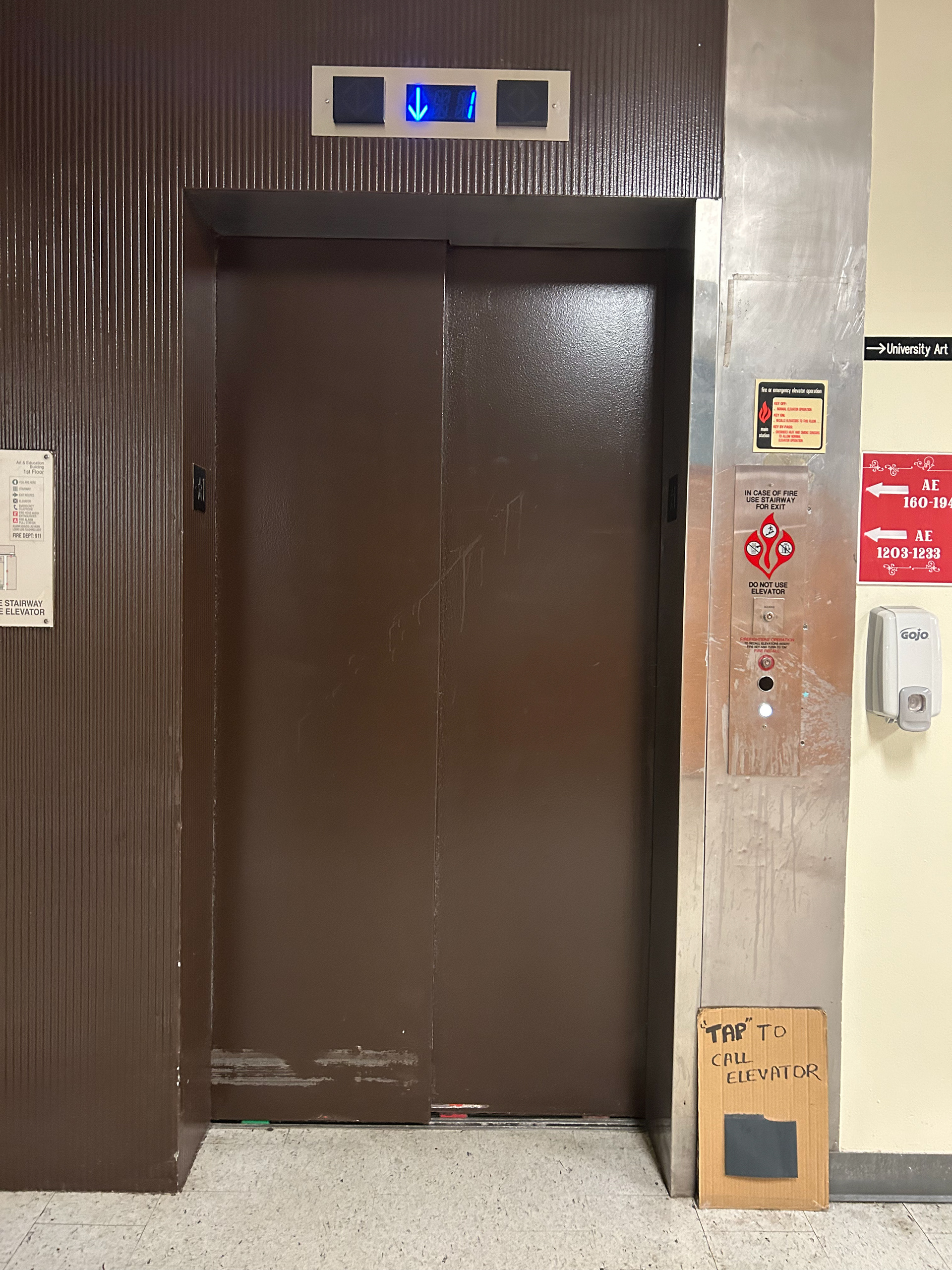 closed elevator with tap sign