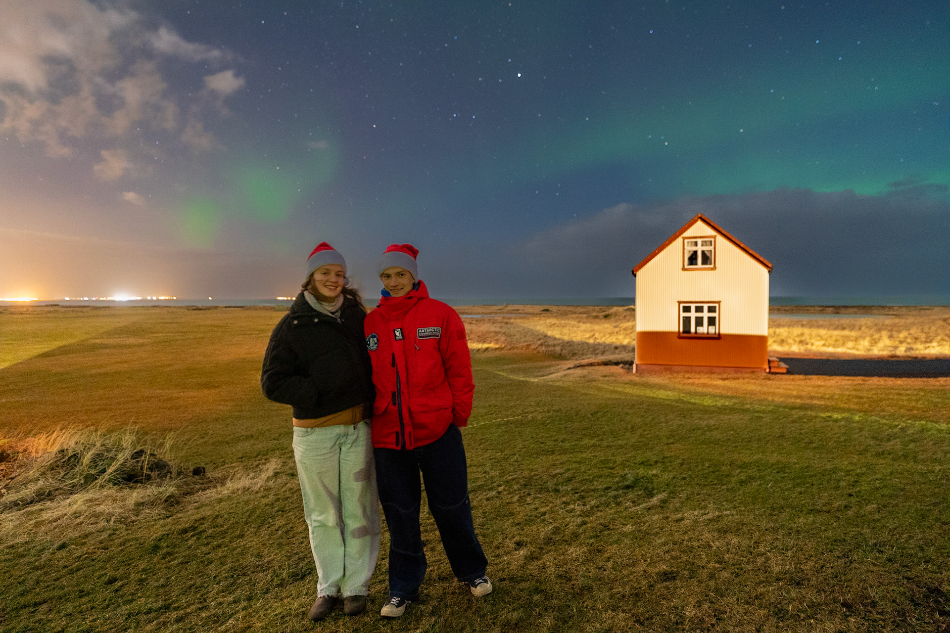 The Northen Lights (aurora borealis) from Kálfatjarn Church