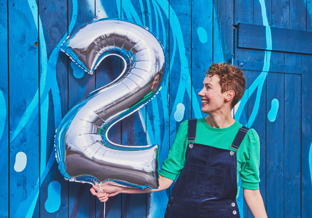 Photo of Sharon Armstrong Creative celebrating 2nd year in business