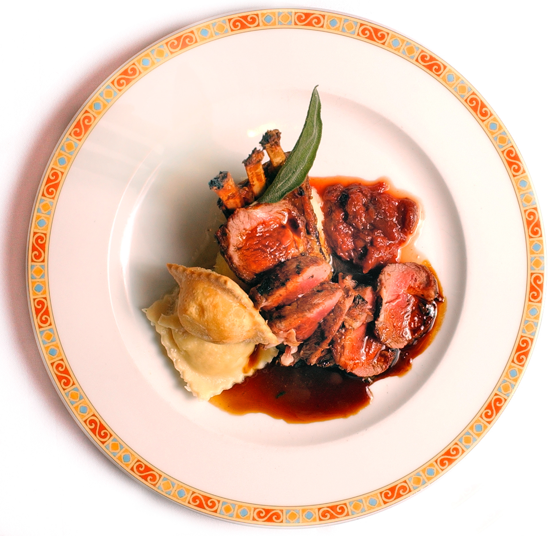 Australian Lamb Chops, brown butter spaghetti squash, crisp goats' cheese ravioli and Pluot preserves.