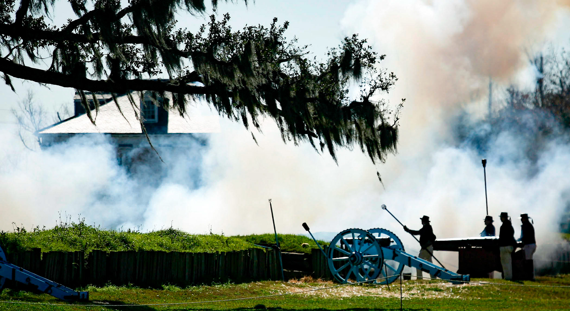 A naval cannon fires along the American lines Saturday during the commemoration of the Battle of New Orleans at Chalmette Battlefield.