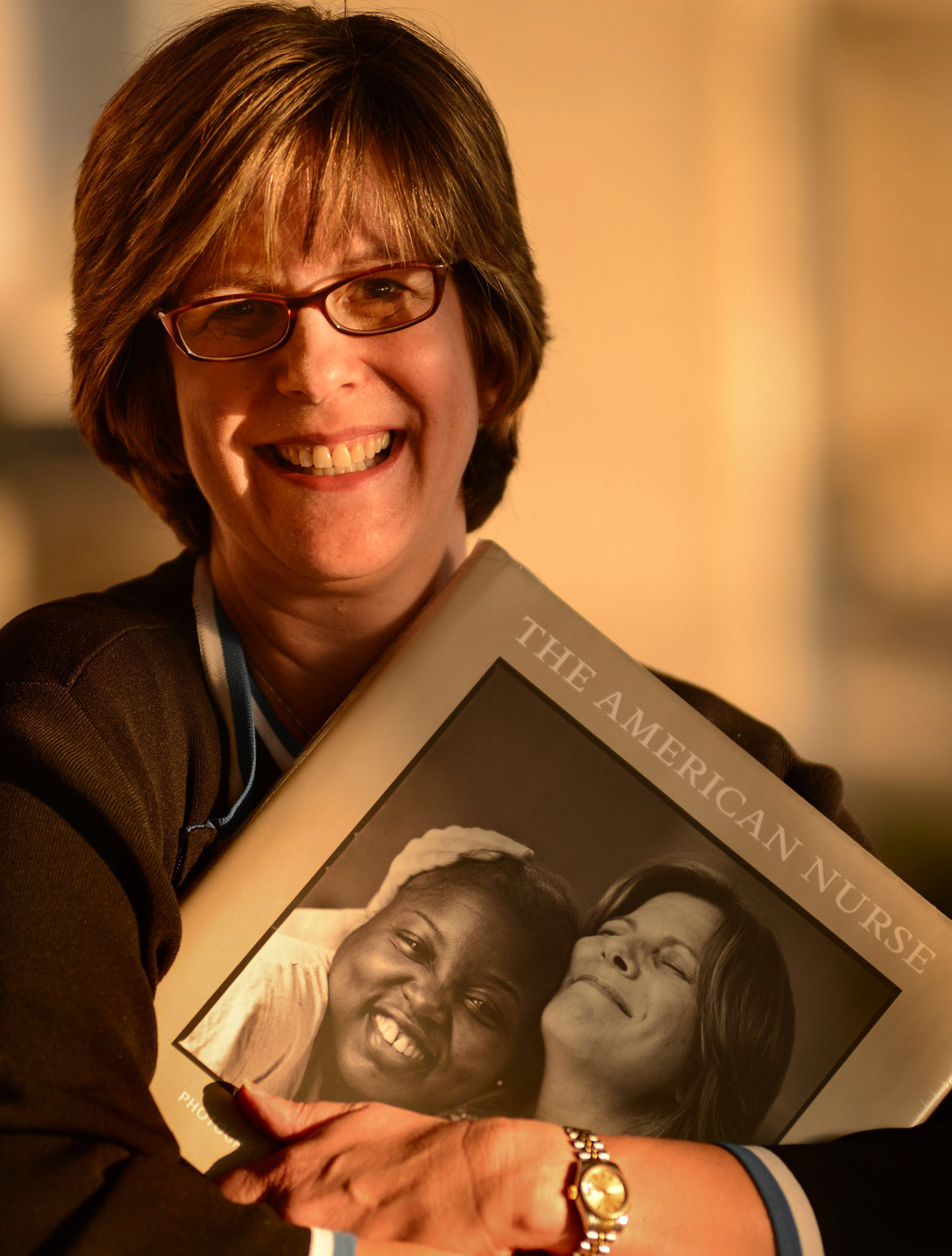 LSU Interim Hospital nurse Colleen Lemoine is featured on the cover of the new coffee table book "The American Nurse" Friday