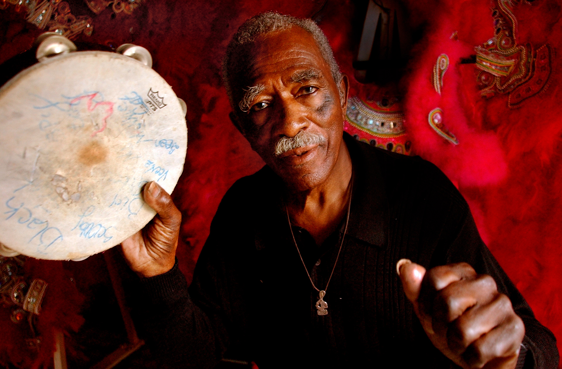 Big Chief Allison "Tootie" Montana, 81, has been retired from masking for several years. This year he will make a suit-his last one he says-and will take to the streets one last time. 