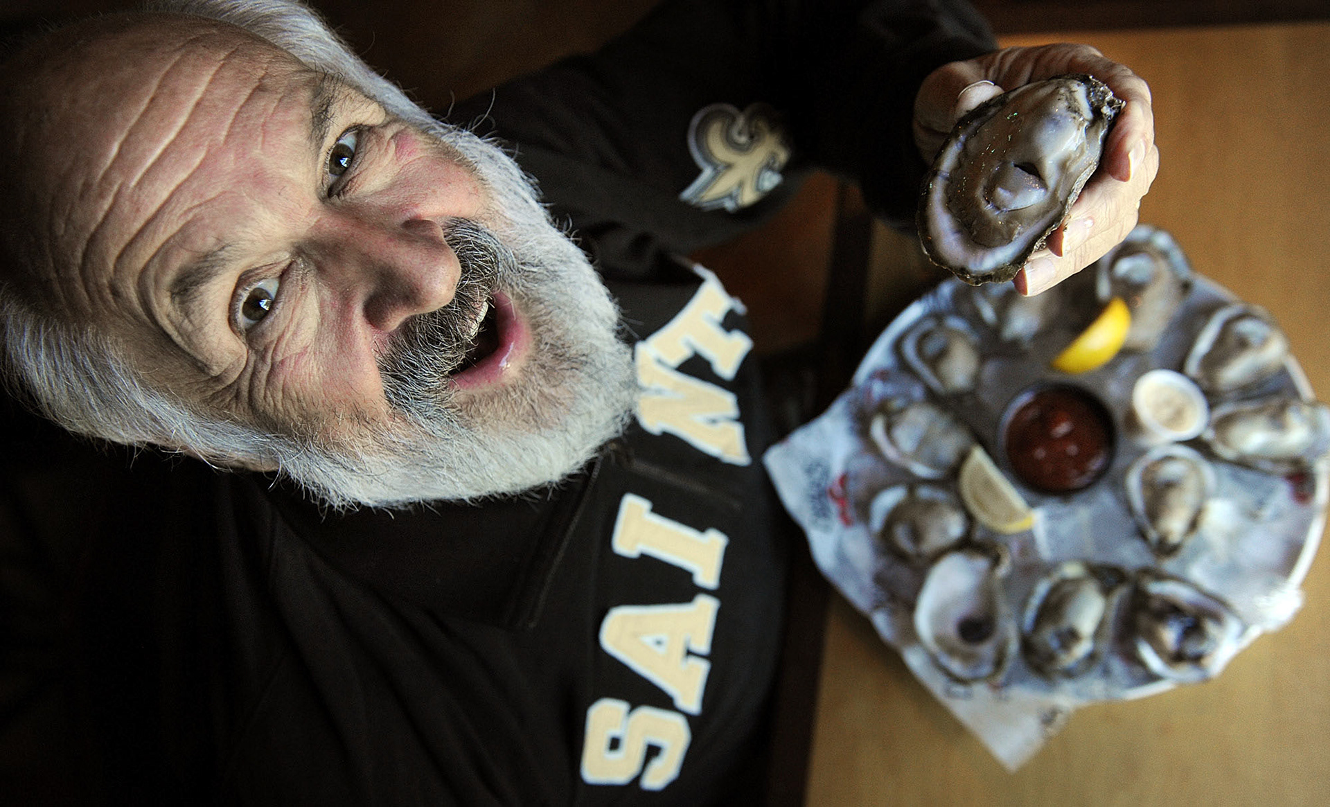 Joe Cahn savors Louisiana oysters at Drago's in Metairie Wednesday.