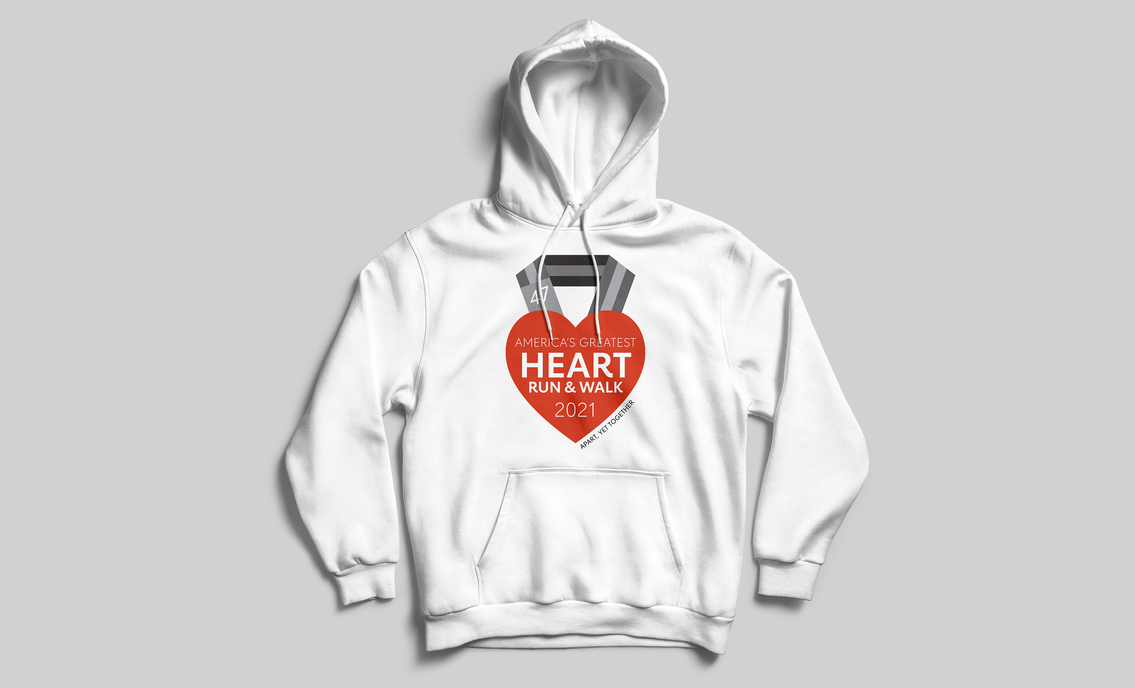 An application of the logo on a white hoodie.