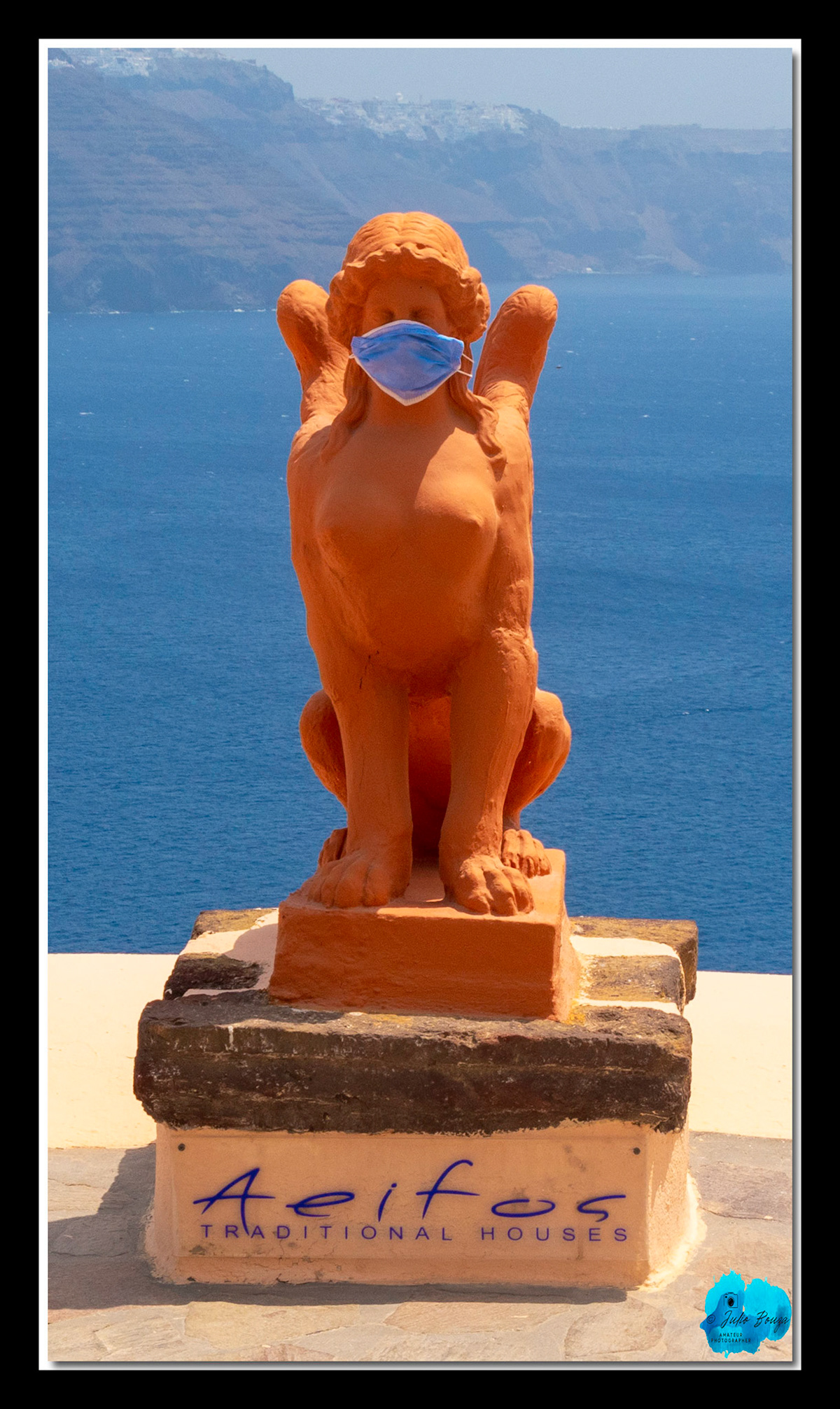 20210806 - Statue At Aeifos Traditional Houses At Oia Village In Santorini