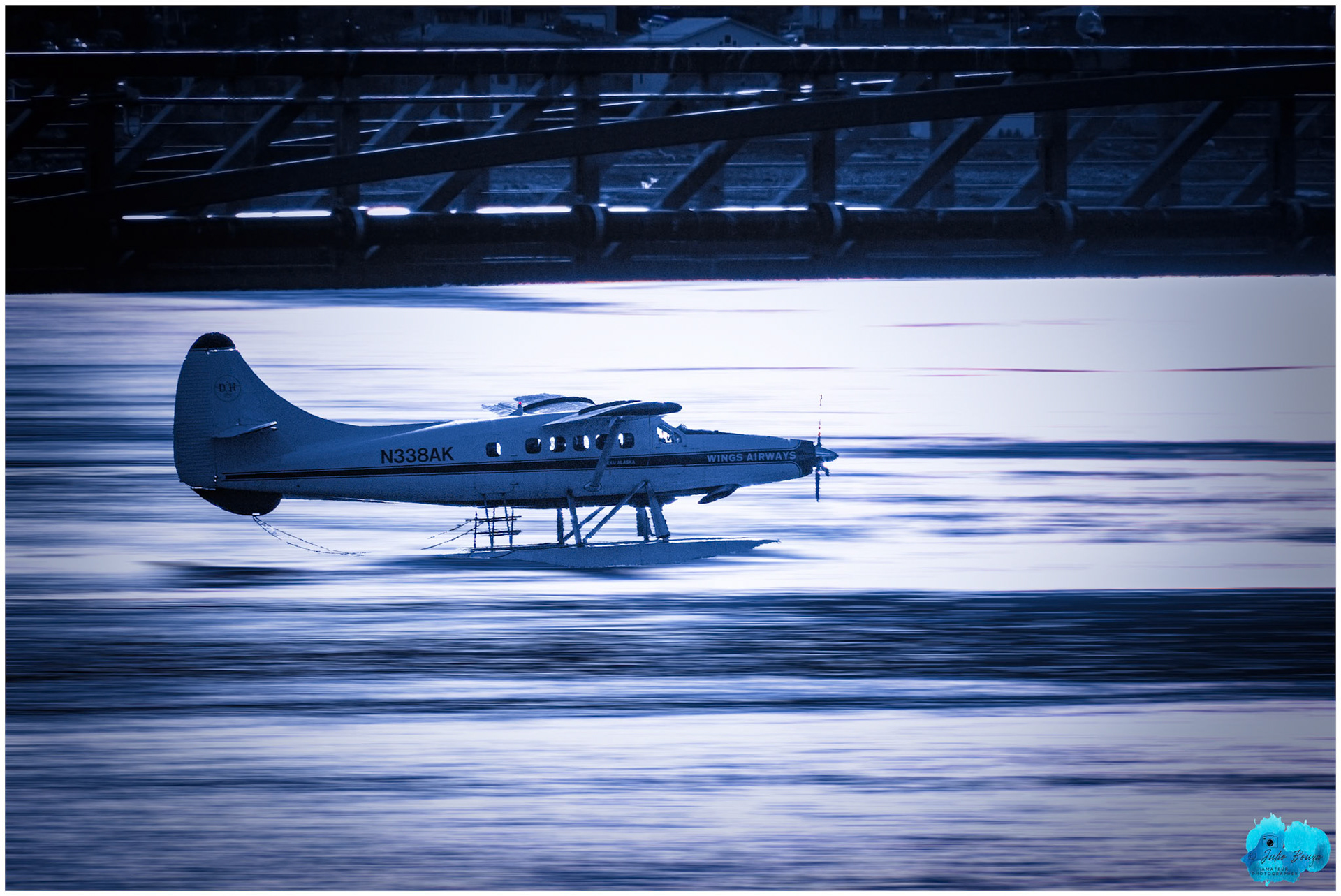 20240504 - Airplane Flying by Juneau Downtown Historic District Landing in Gastineau Channel